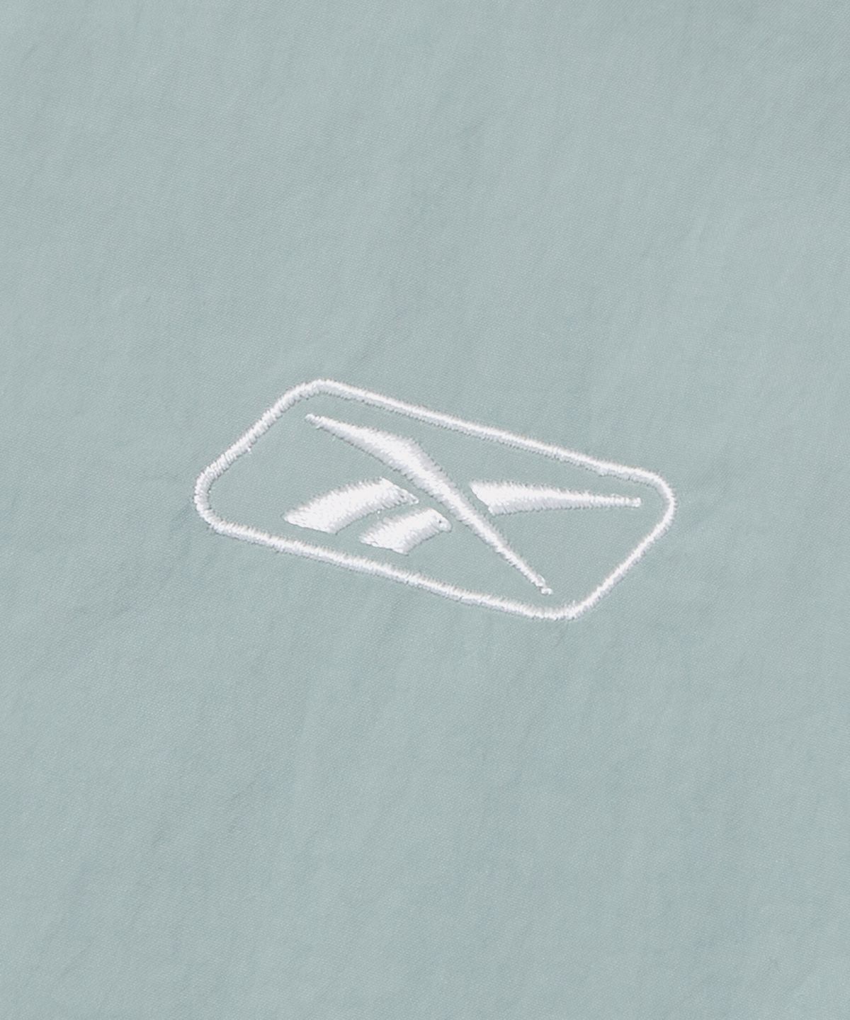 리복(REEBOK) 프리미어 크롭 트랙 경량 패딩 (W) - 민트
