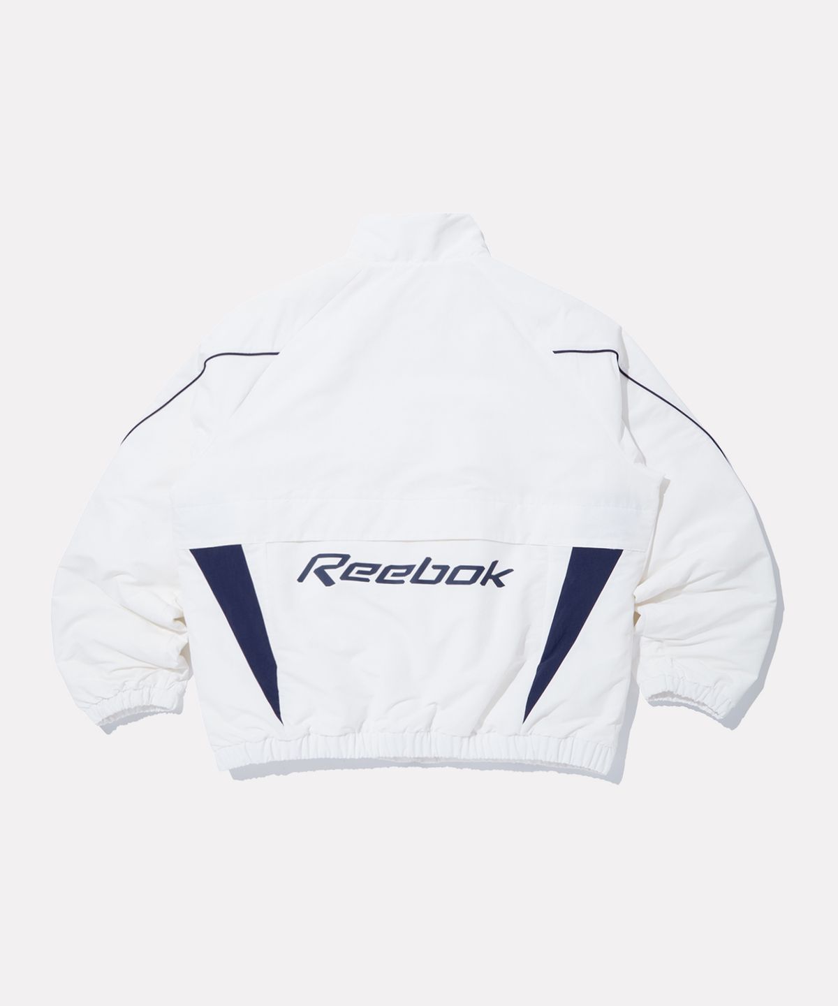 리복(REEBOK) 프리미어 트랙 경량 패딩 - 오프 화이트