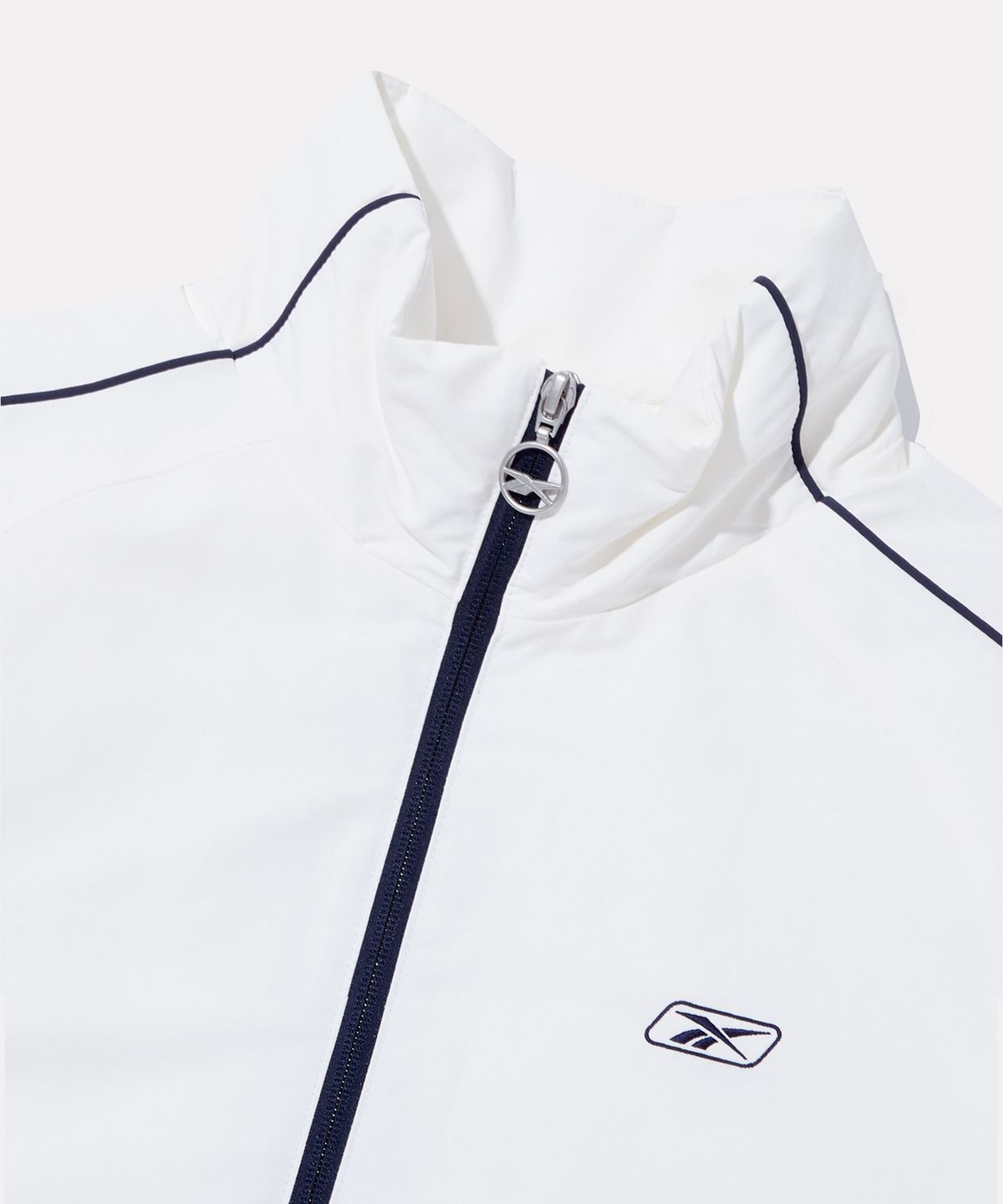 리복(REEBOK) 프리미어 트랙 경량 패딩 - 오프 화이트