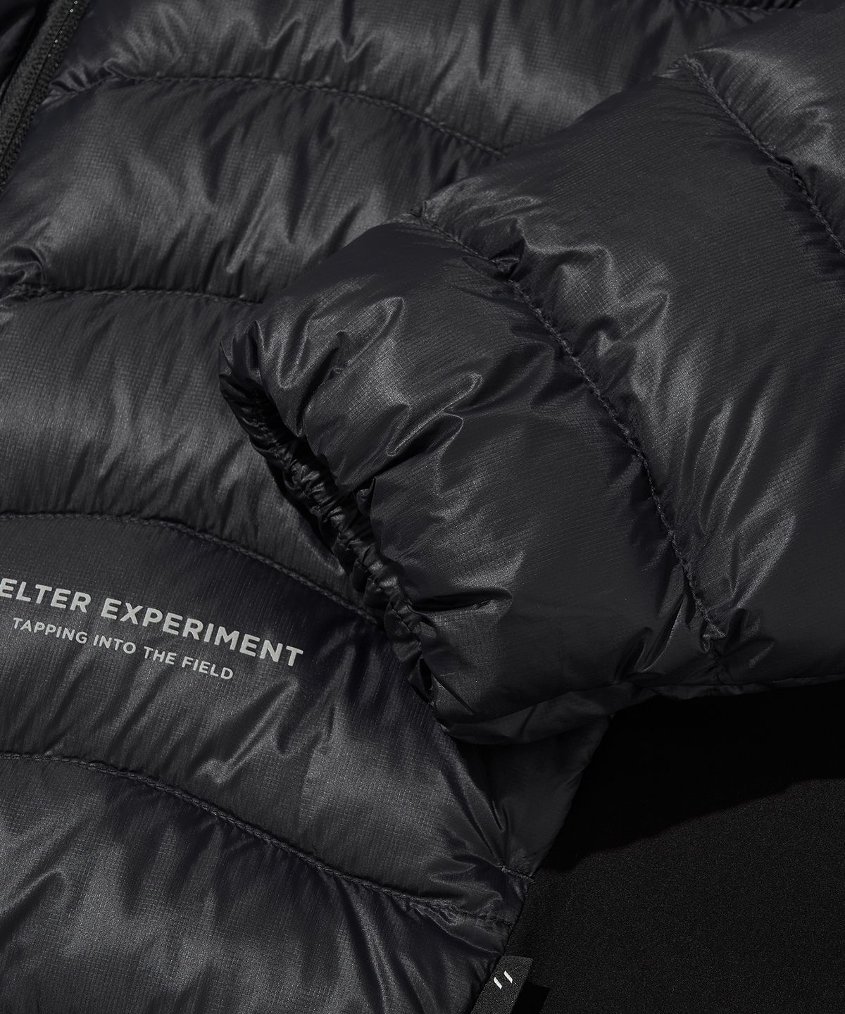 웰터 익스페리먼트(WELTER EXPERIMENT) PEAKLITE LIGHTWEIGHT PERTEX DOWN JACKET_BLACK