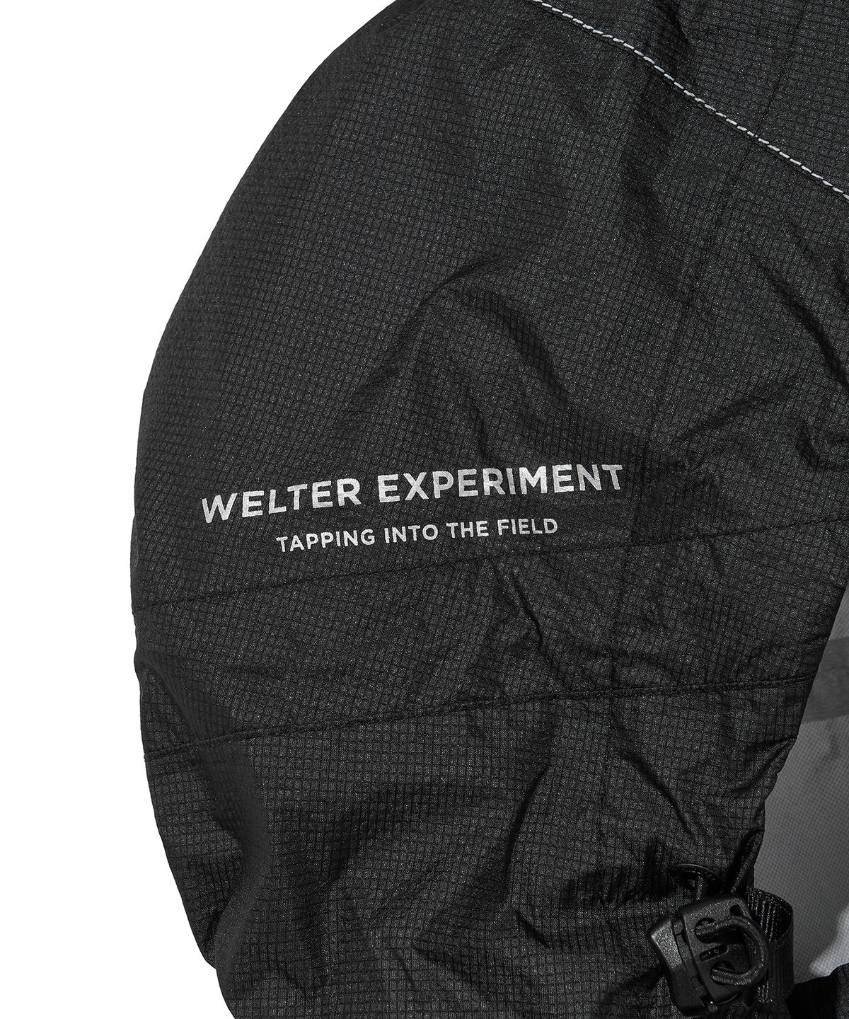 웰터 익스페리먼트(WELTER EXPERIMENT) VETRA SEALED WINDBREAKER JACKET_BLACK