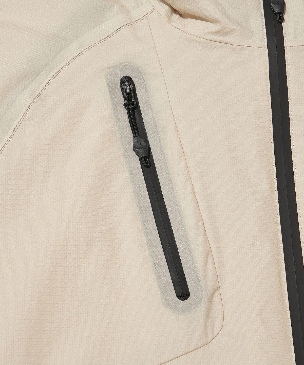 웰터 익스페리먼트(WELTER EXPERIMENT) VETRA SEALED WINDBREAKER JACKET_IVORY