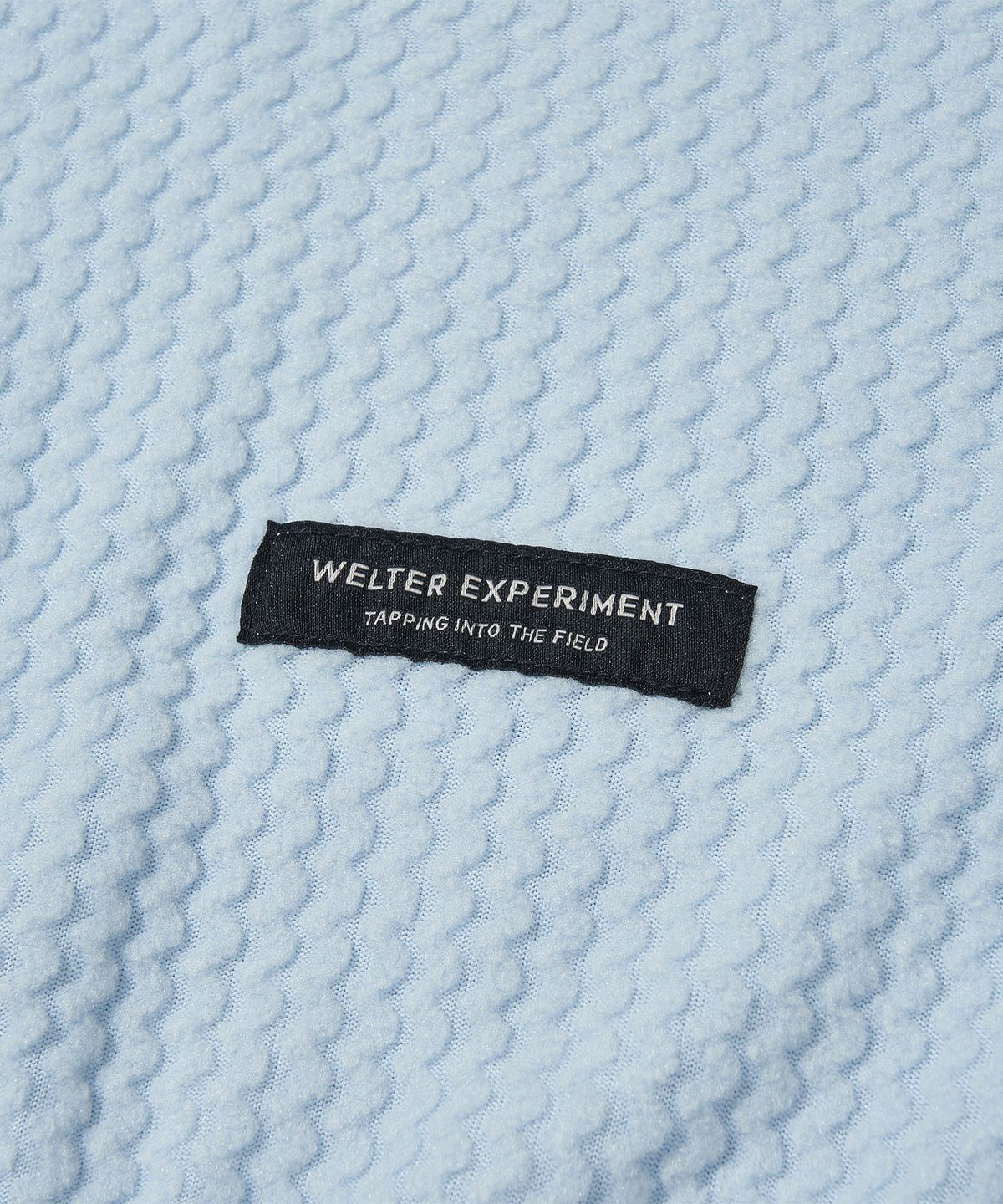 웰터 익스페리먼트(WELTER EXPERIMENT) 칼로라 플리스 후디드 풀오버 스카이 블루