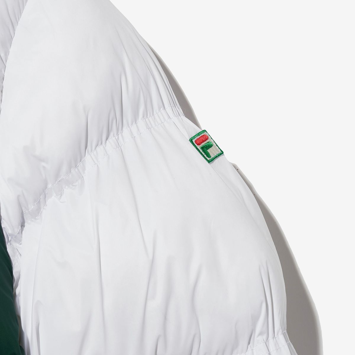 휠라(FILA) F+ PANINO PUFFER JACKET(FO254DJ10X001100)