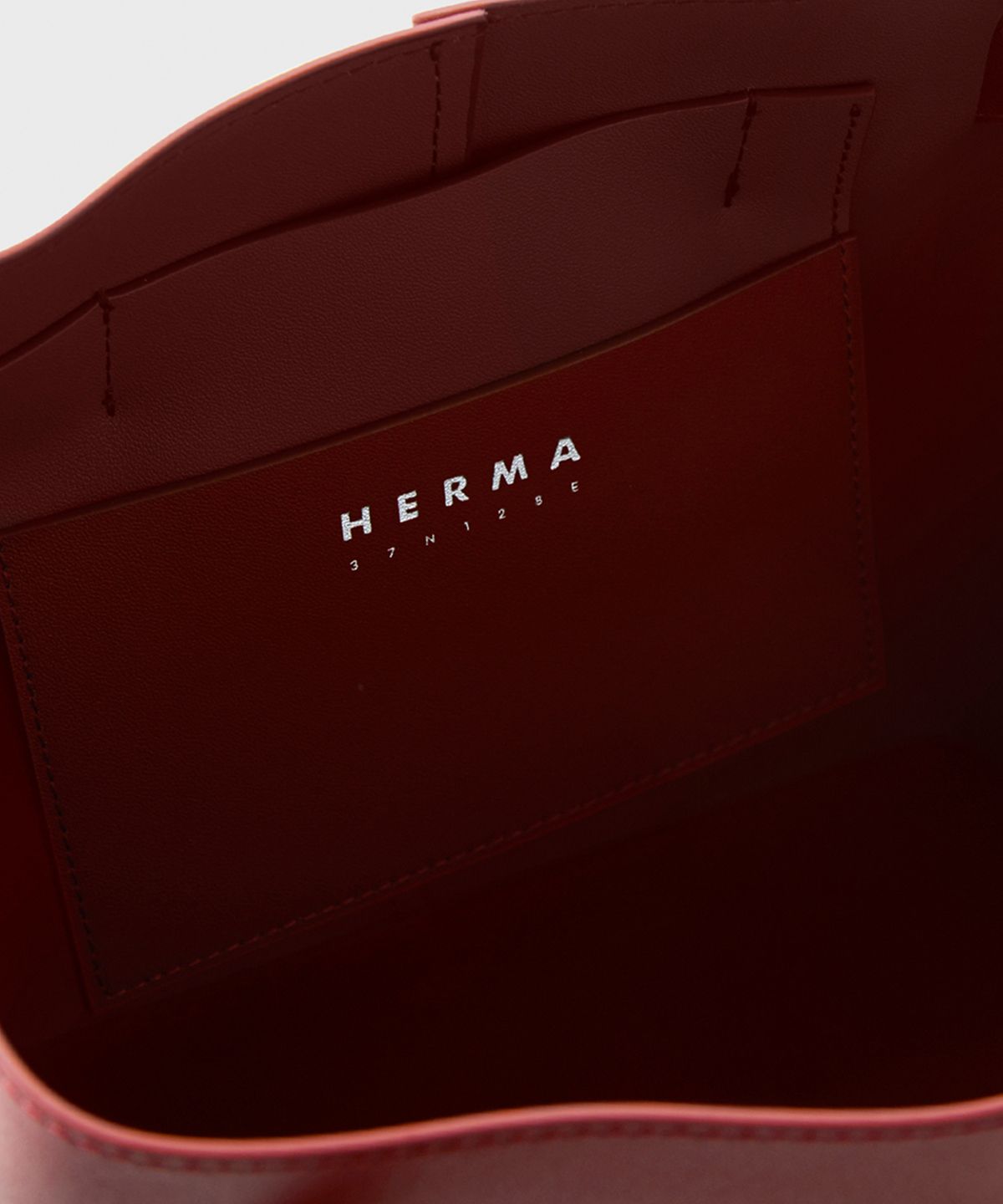 헤르마(HERMA) 벨트 버킷백 레드