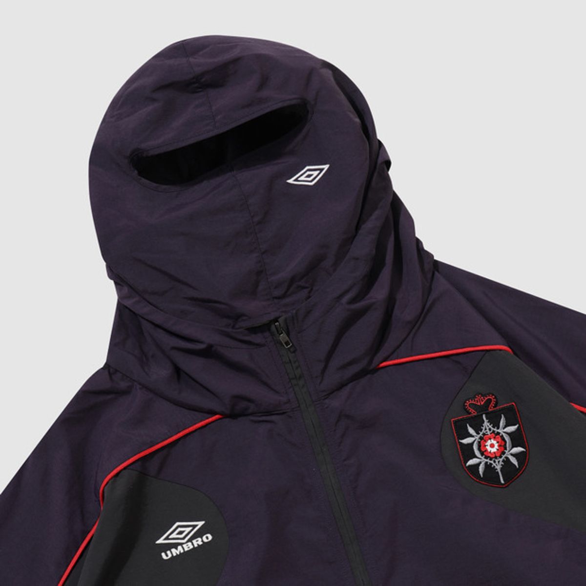 엄브로(UMBRO) [UMBRO X SLAM JAM] Rose Crest 마스크 자켓 퍼플 UQ411CJKO2