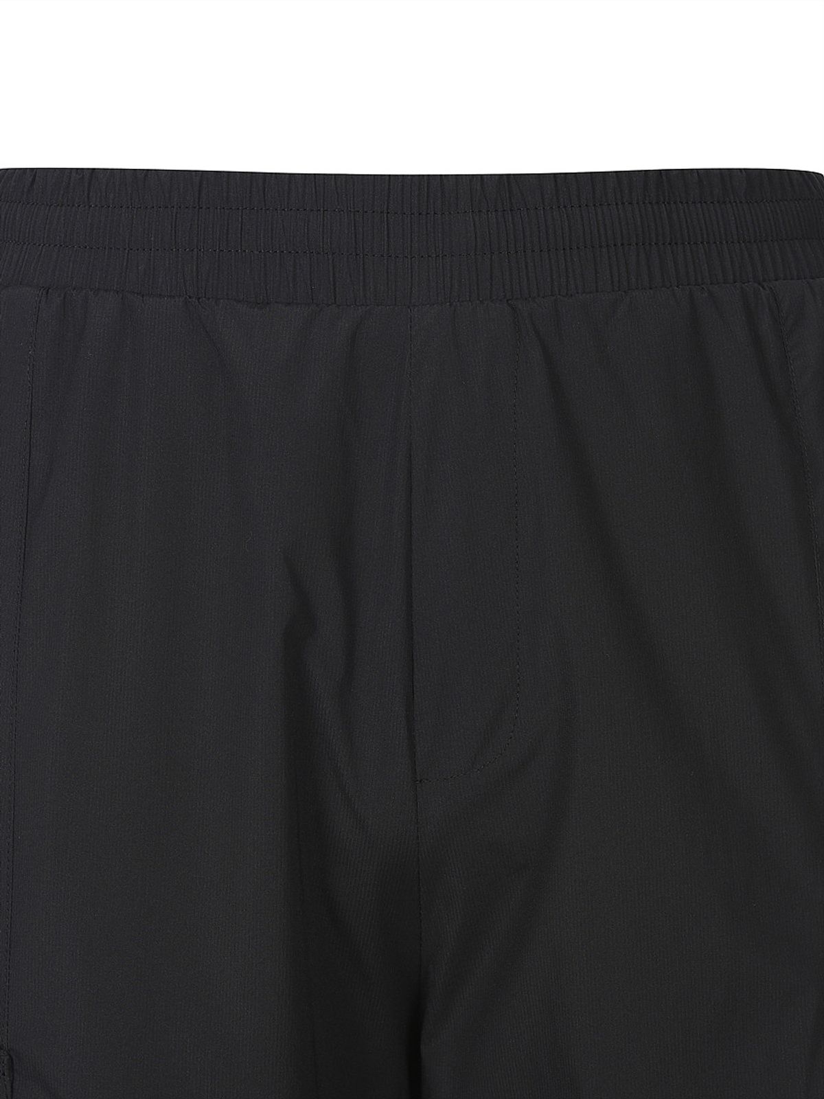 디스커버리 익스페디션(DISCOVERY EXPEDITION) 남성 메쉬 기모 우븐 트레이닝 스트링 팬츠 (BLACK)