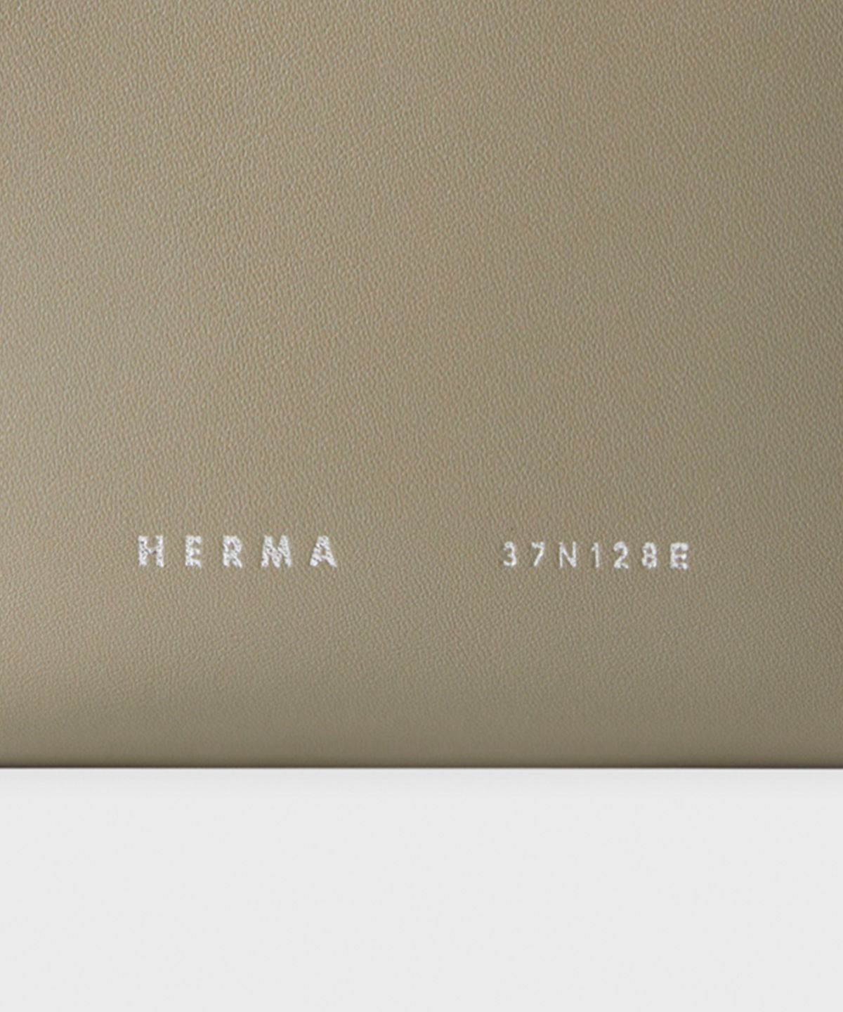 헤르마(HERMA) 로디 지퍼 미니 지갑 에크루