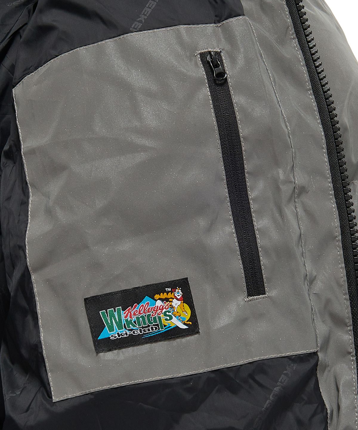 위캔더스(WKNDRS) KELLOGGS SPONSOR PUFFER JK (L.GREY)