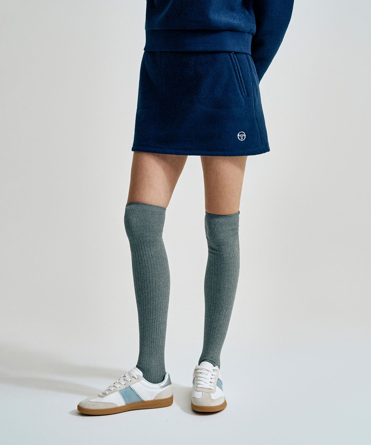 세르지오 타키니(SERGIO TACCHINI) W MC 마이크로플리스 스커트 (Navy)