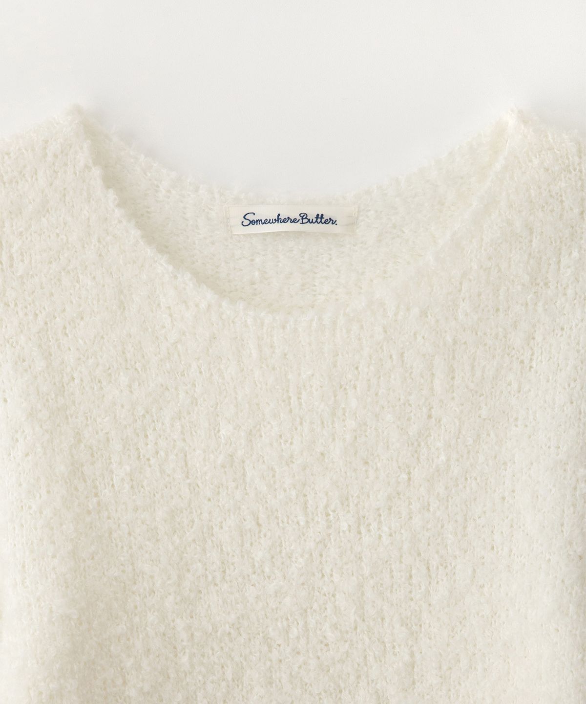 썸웨어버터(SOMEWHEREBUTTER) Boucle Long Sleeve Knit - Ivory