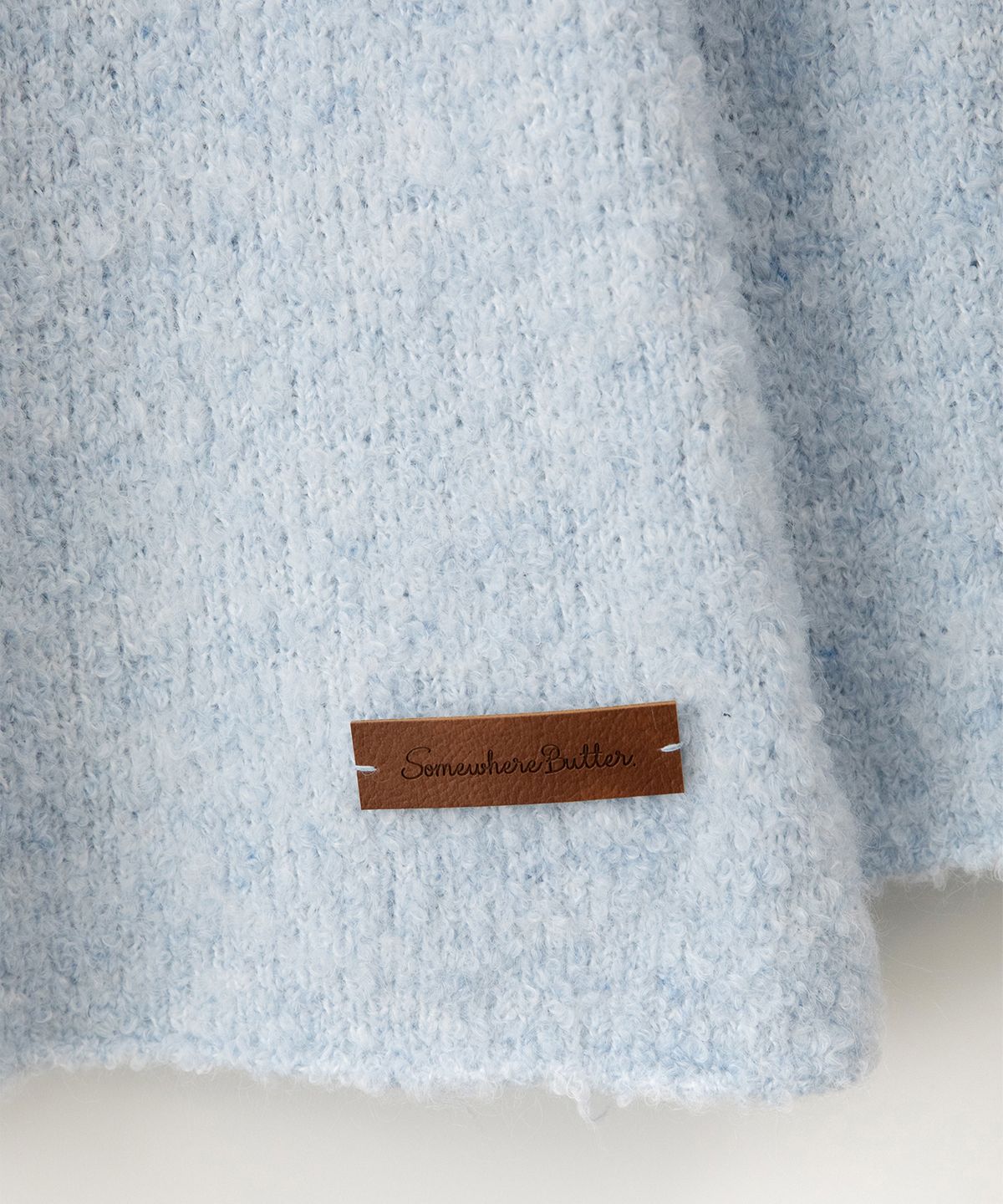 썸웨어버터(SOMEWHEREBUTTER) Boucle Long Sleeve Knit - Light Blue