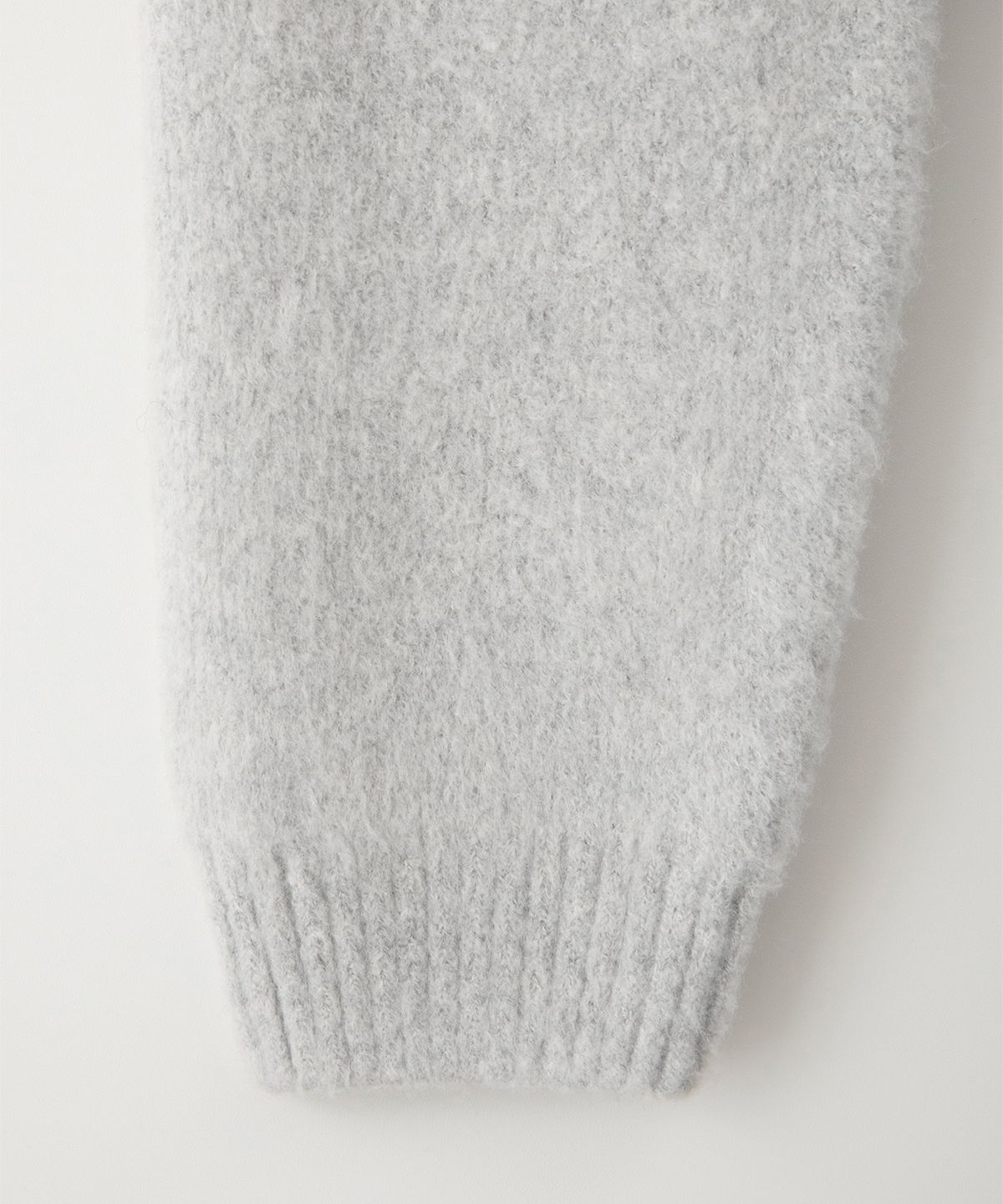 썸웨어버터(SOMEWHEREBUTTER) Puppy Wool Knit - Light Grey