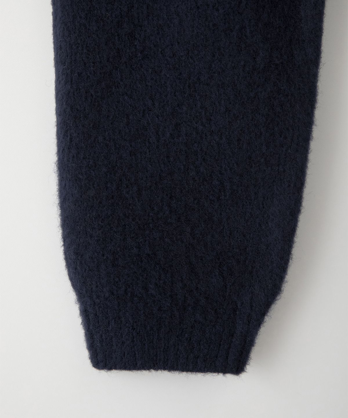 썸웨어버터(SOMEWHEREBUTTER) Puppy Wool Knit - Navy