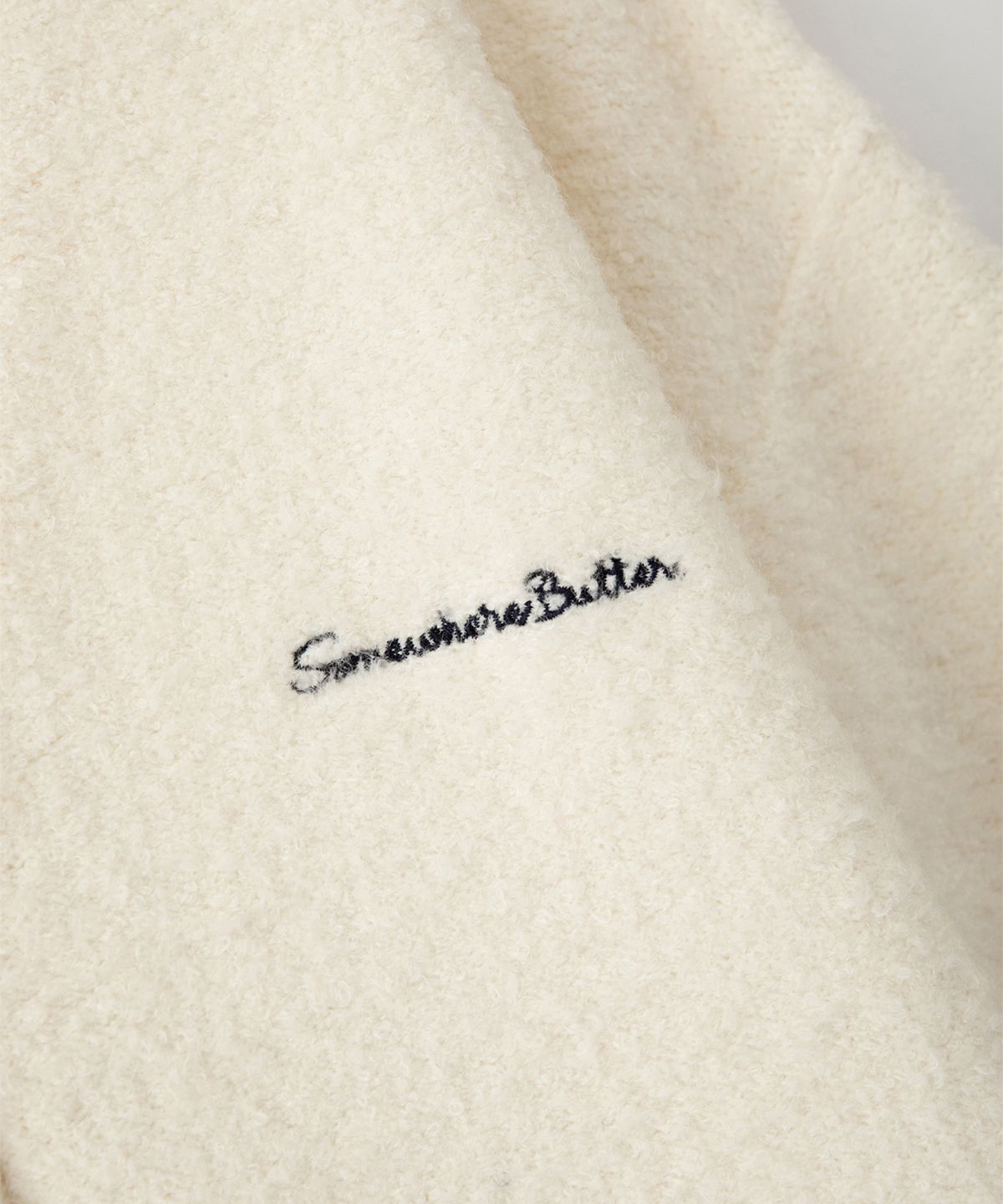 썸웨어버터(SOMEWHEREBUTTER) Rima Boucle V-Neck Cardigan - Ivory
