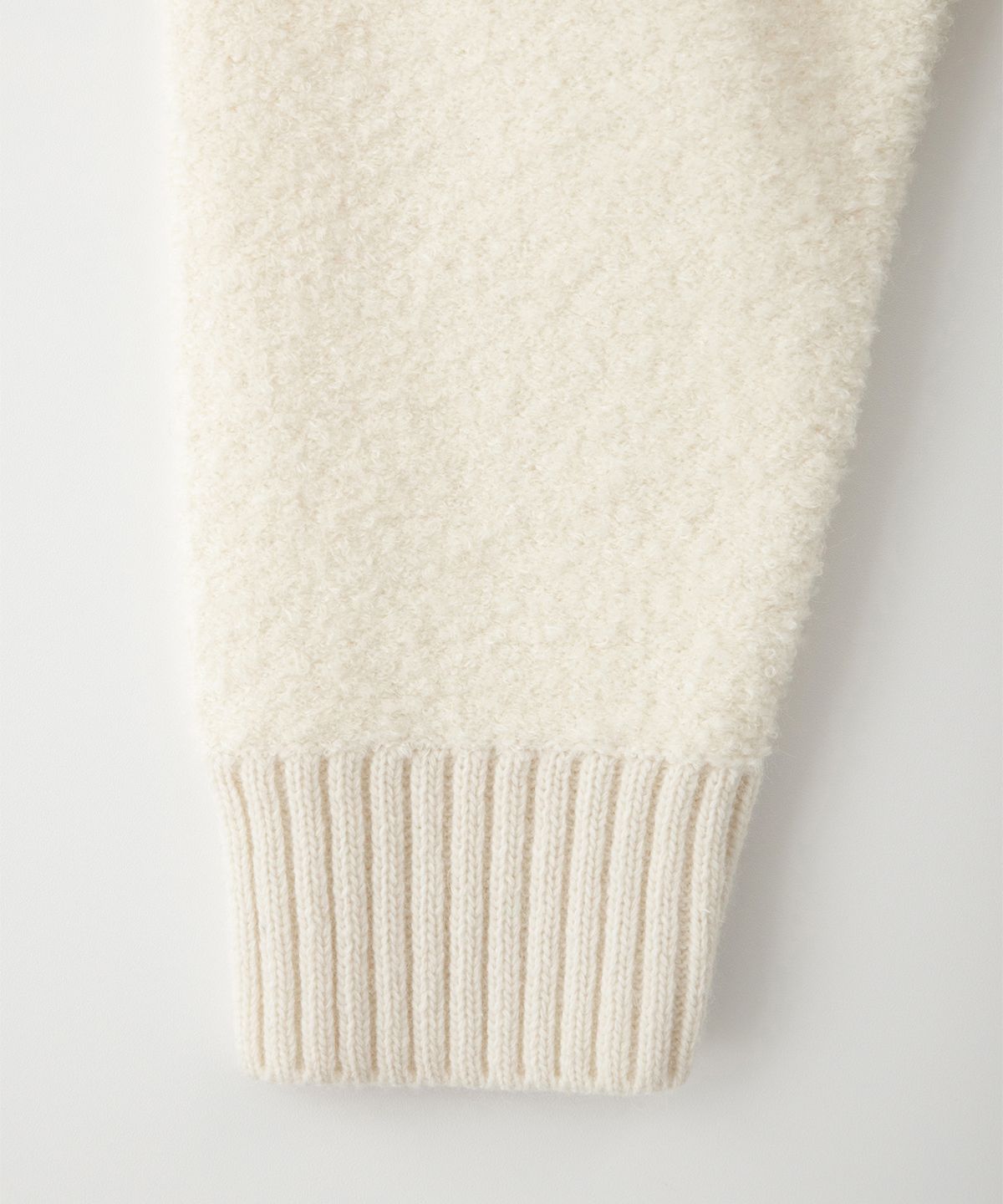 썸웨어버터(SOMEWHEREBUTTER) Rima Boucle V-Neck Cardigan - Ivory