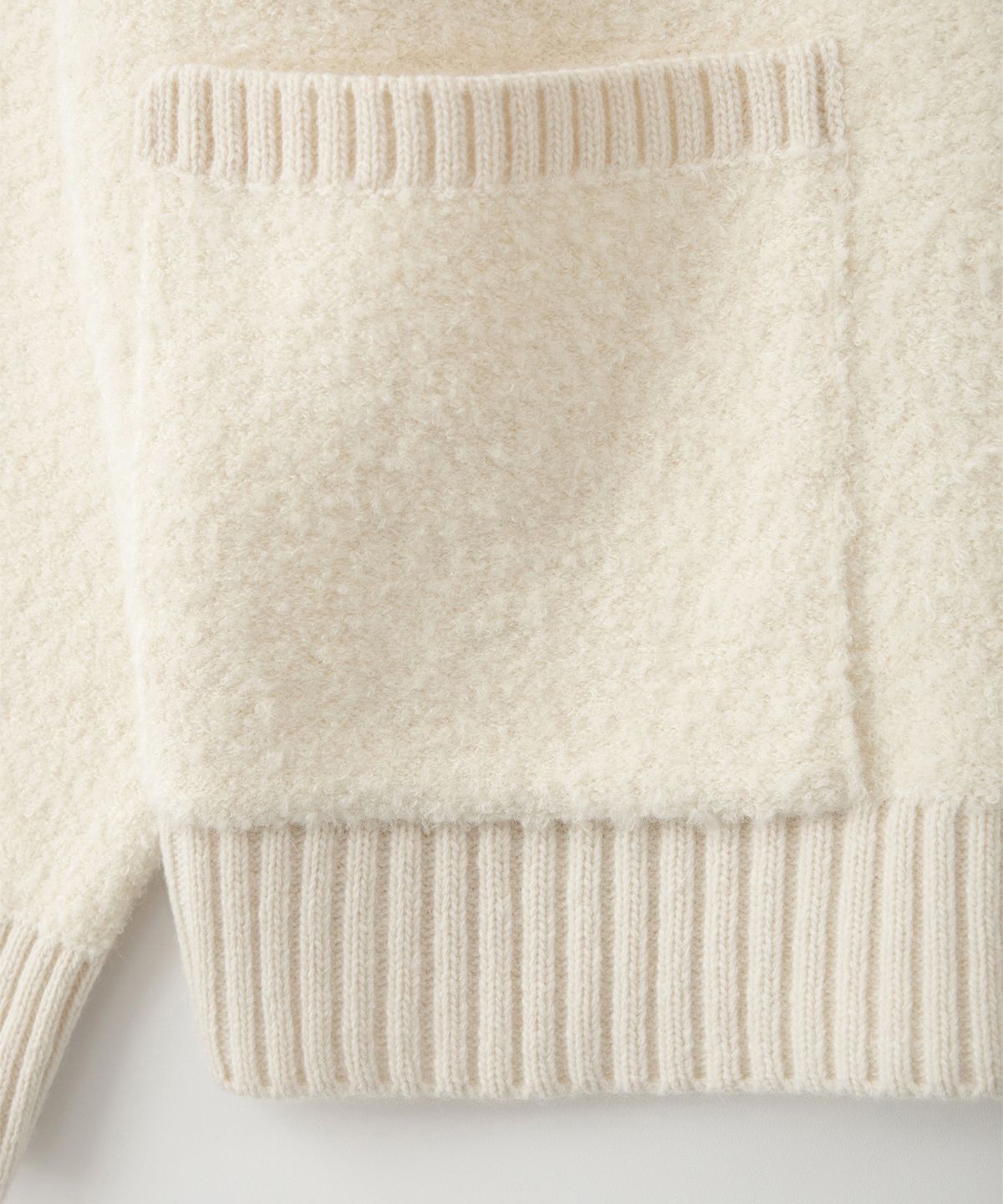 썸웨어버터(SOMEWHEREBUTTER) Rima Boucle V-Neck Cardigan - Ivory