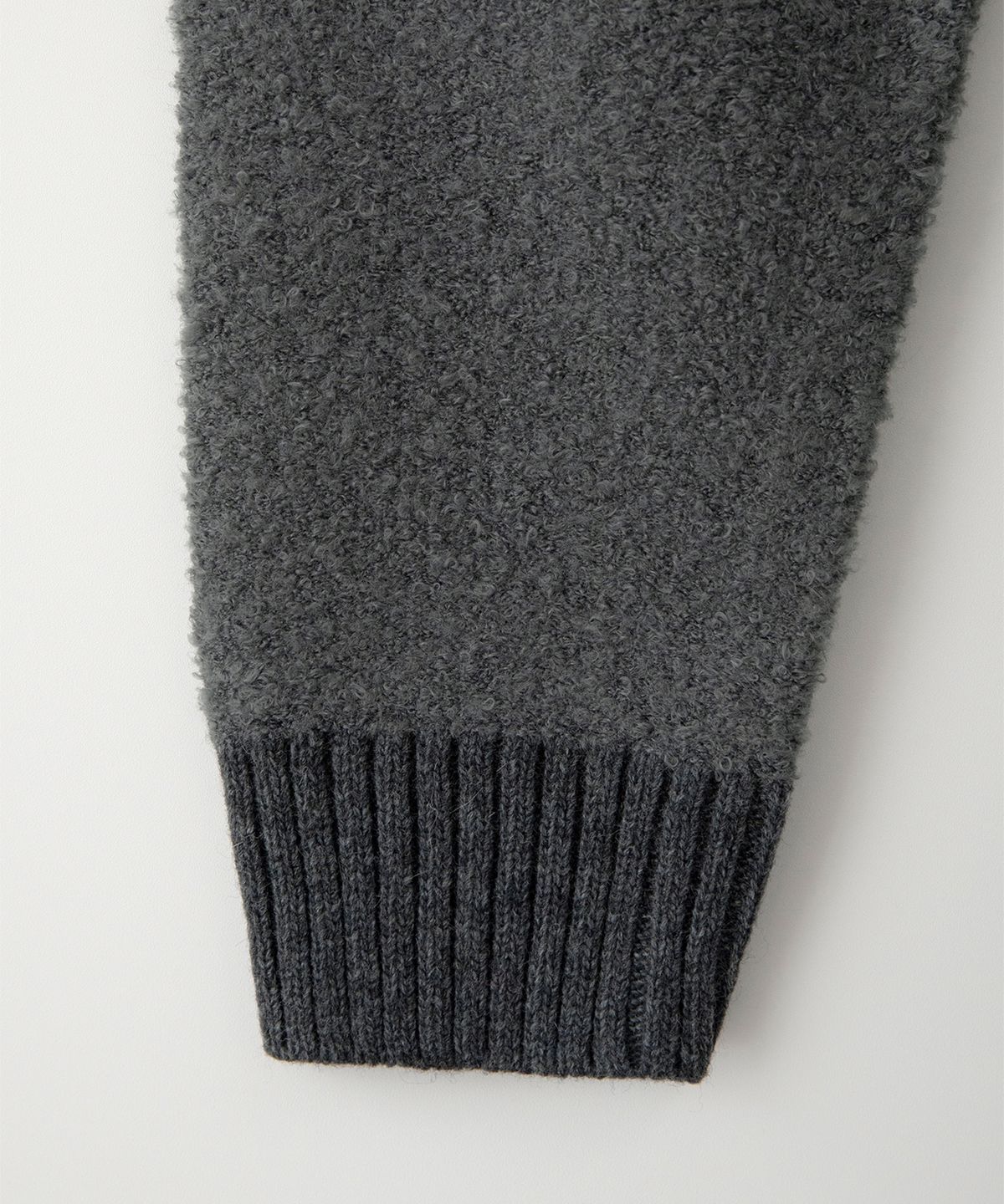 썸웨어버터(SOMEWHEREBUTTER) Rima Boucle V-Neck Cardigan - Charcoal