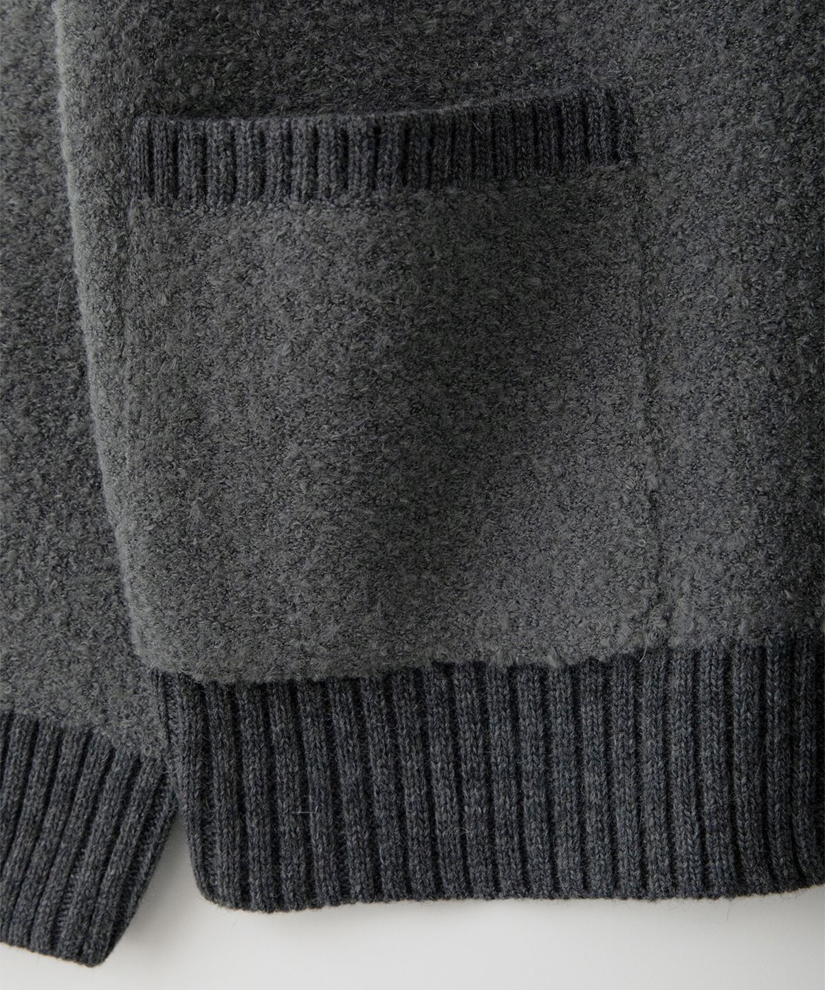 썸웨어버터(SOMEWHEREBUTTER) Rima Boucle V-Neck Cardigan - Charcoal