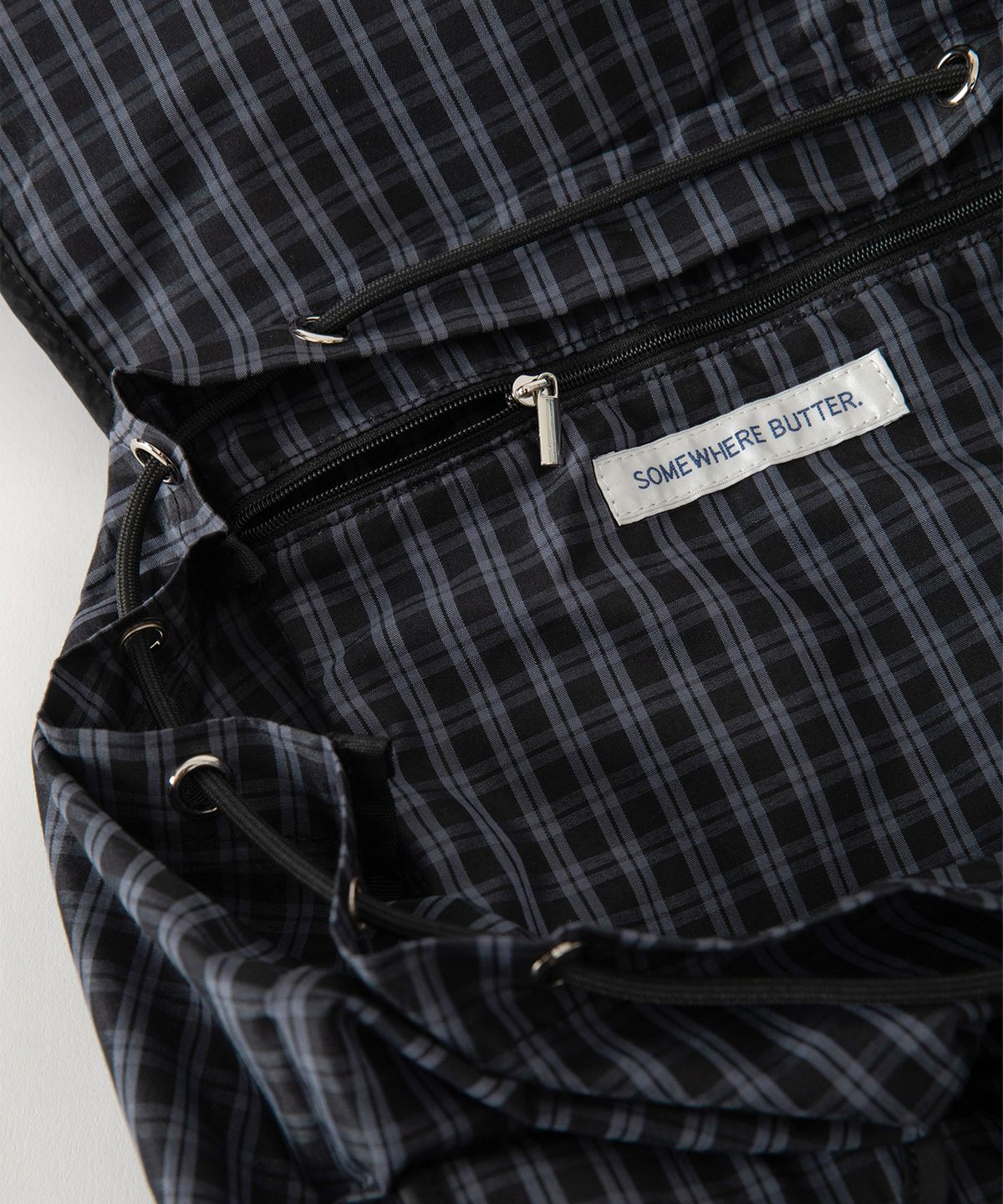 썸웨어버터(SOMEWHEREBUTTER) Check PP Backpack - Charcoal