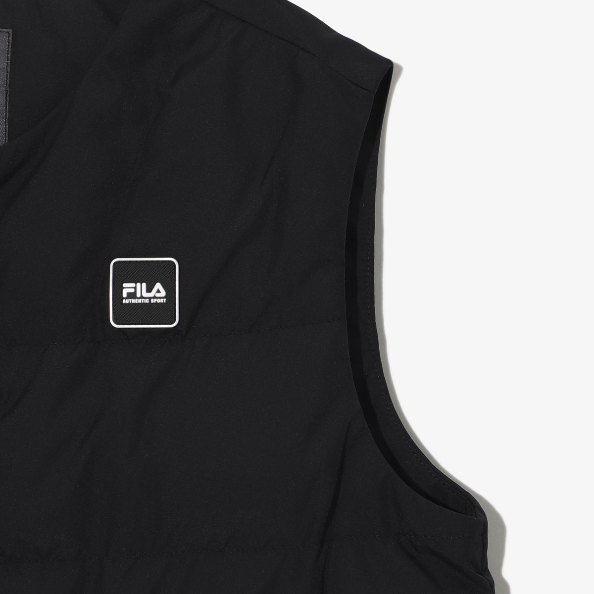 휠라 키즈(FILA KIDS) 간절기 패딩 조끼