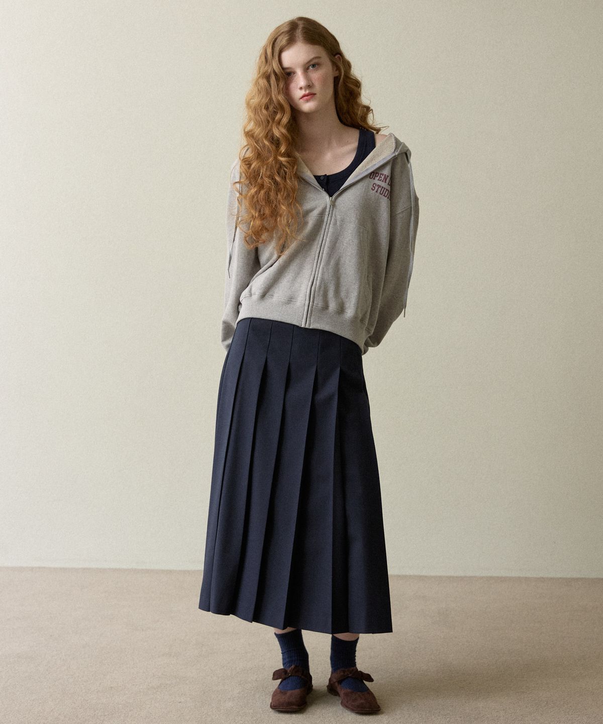 오픈도어스튜디오(OPENDOORSTUDIO) medium long  pleated skirt navy
