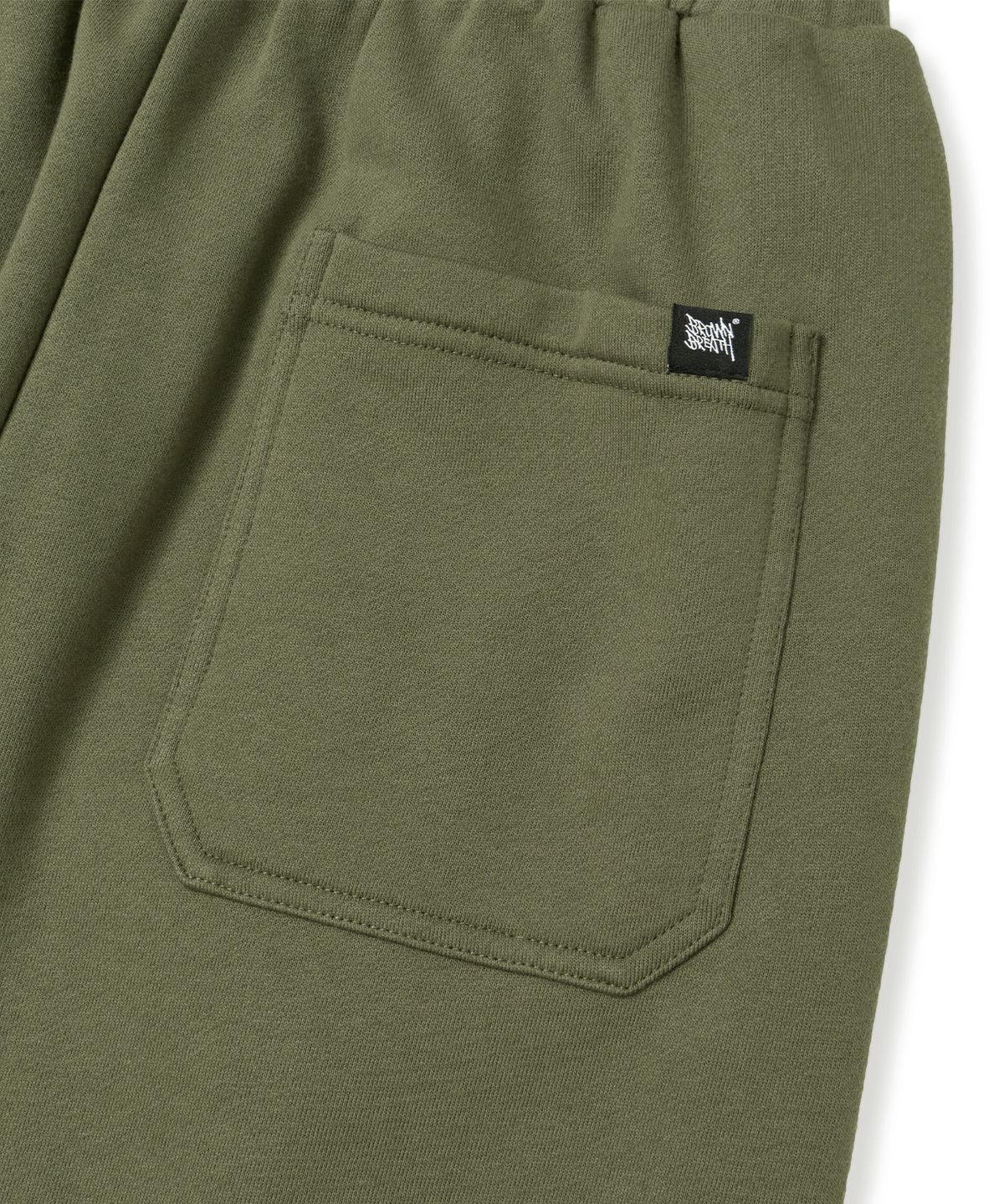 브라운브레스(BROWNBREATH) TAG TWO TUCK WIDE SWEAT PANTS - KHAKI