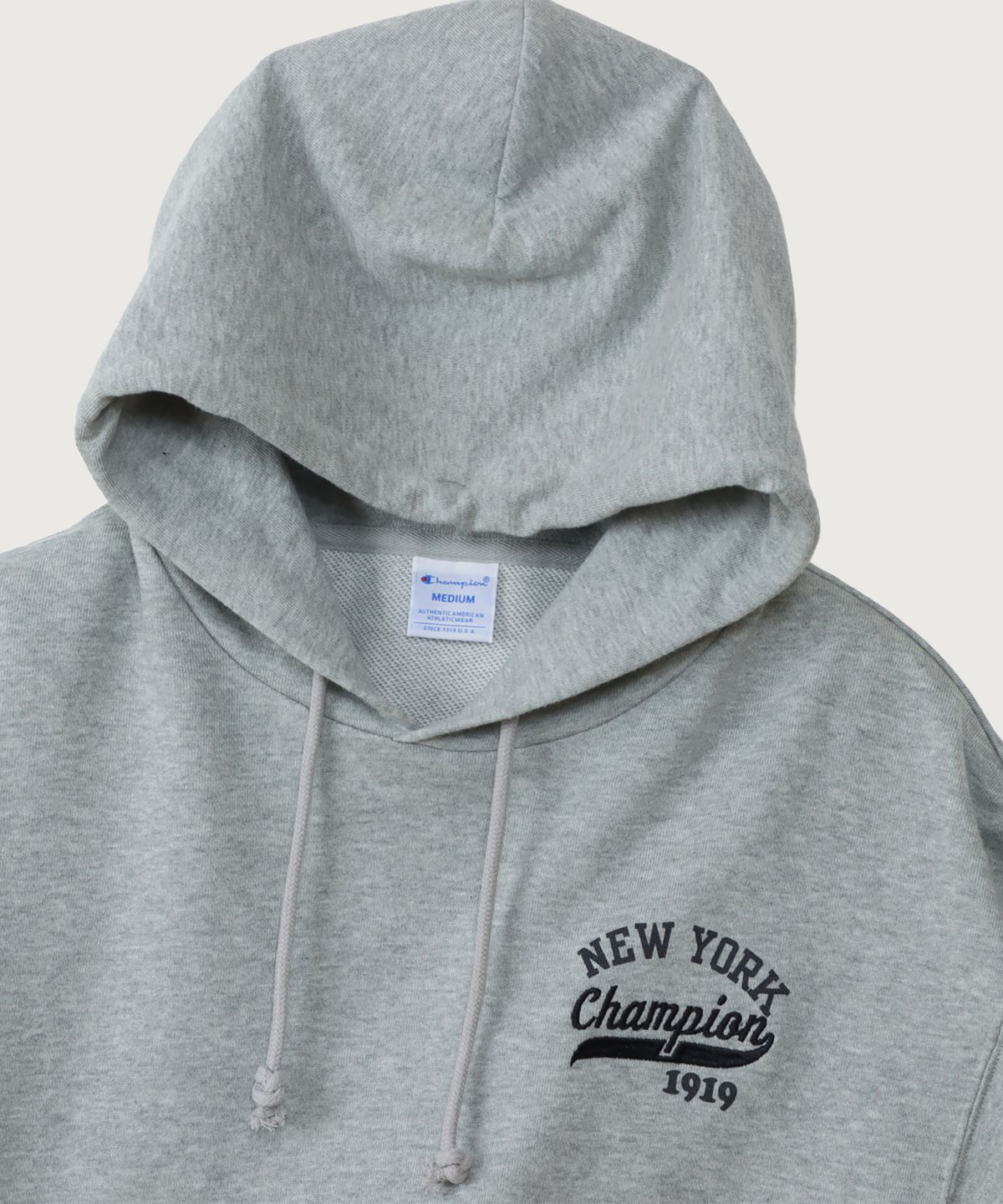 챔피온(CHAMPION) 여성 NEW YORK 루즈핏 후드 티셔츠 Oxford Grey