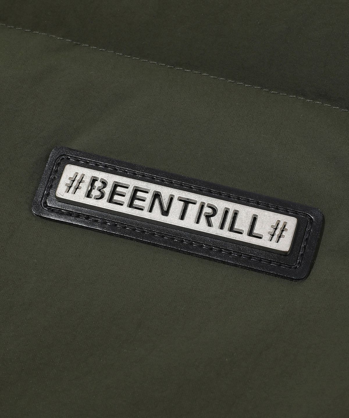 빈트릴(BEENTRILL) 와펜 하이넥 숏패딩 베스트(올리브)