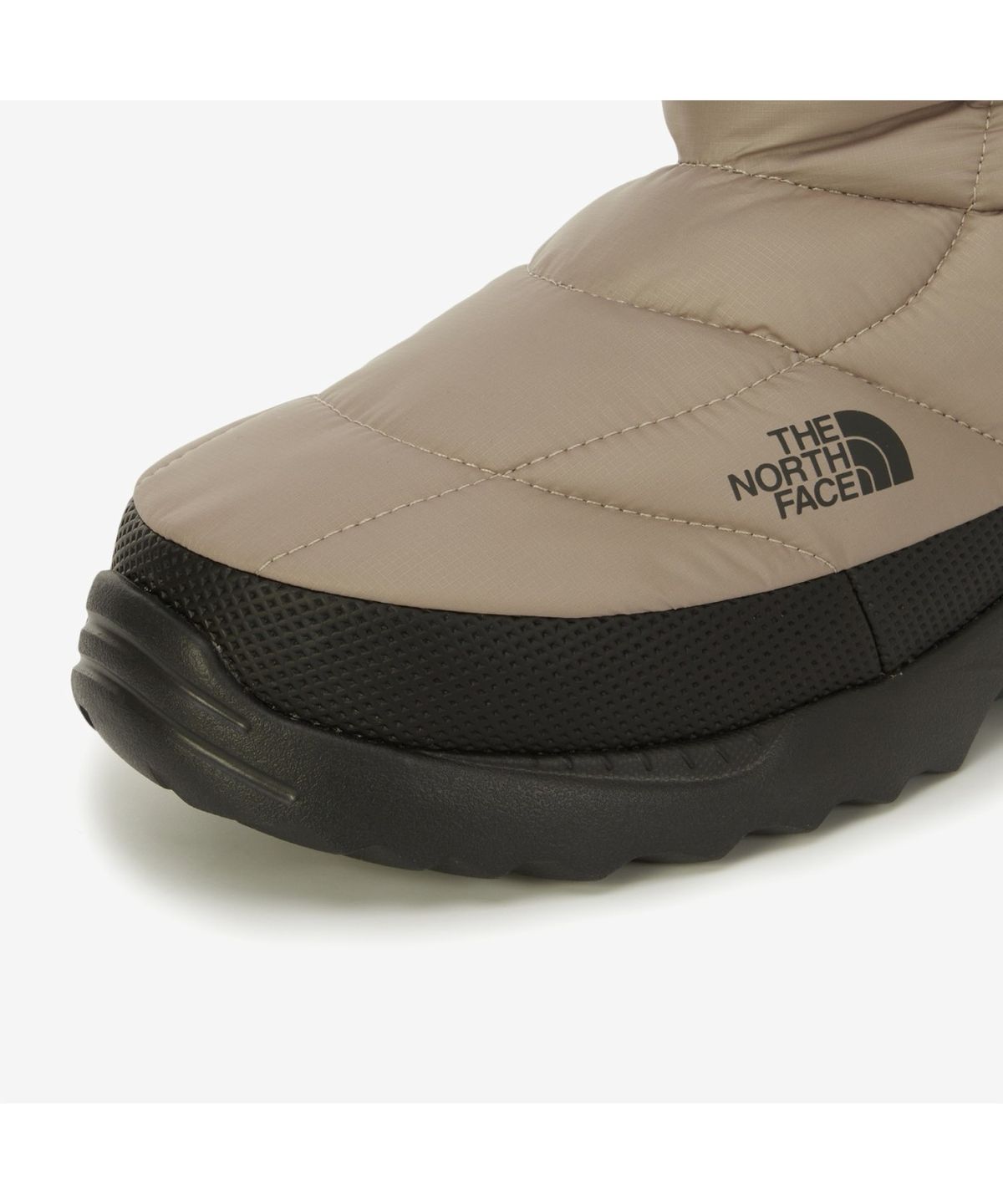 노스페이스(THE NORTH FACE) NS87R57B 눕시 트렉션 츄카 BEIGE