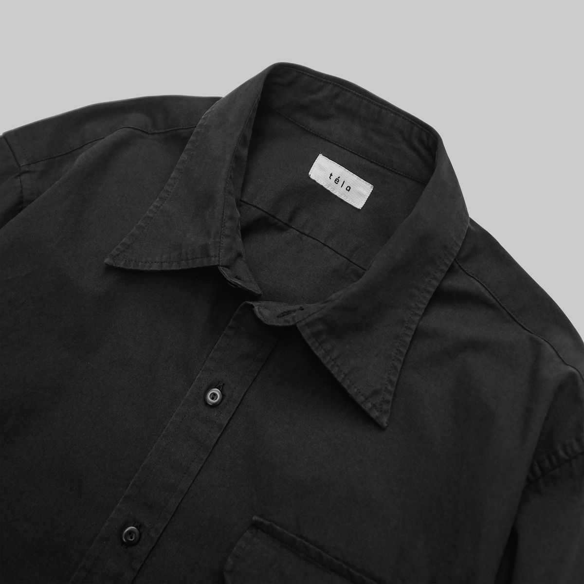 뗄라(TELA) Black Cotton One Pocket Shirt