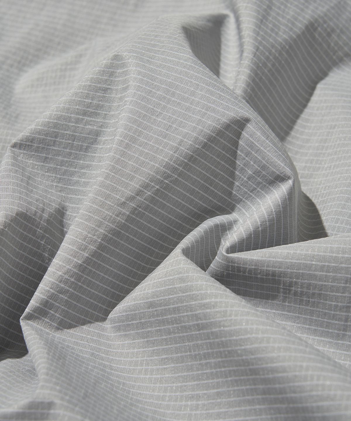 웰터 익스페리먼트(WELTER EXPERIMENT) VENTHRA HIKE SKIRT_SILVER