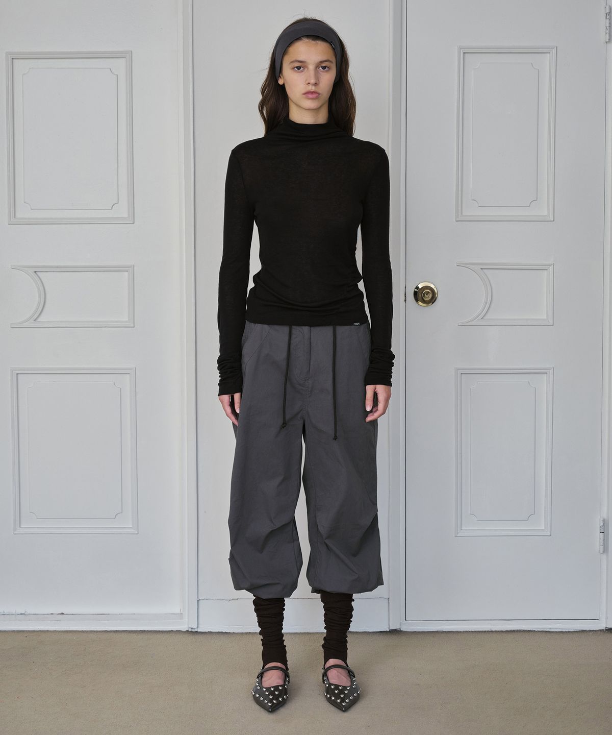 시메트릭 퍼센트(SYMMETRICPERCENT) Wool Turtleneck Top / Black
