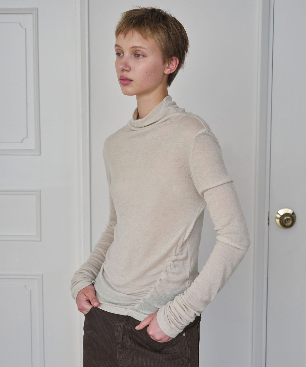 시메트릭 퍼센트(SYMMETRICPERCENT) Wool Turtleneck Top / Light Beige