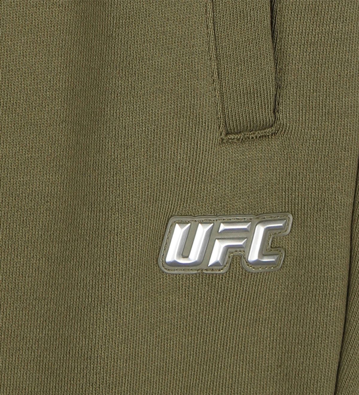 유에프씨 스포츠(UFC SPORT) UFC 로고 와펜 릴렉스핏 조거팬츠 카키 U2LPW3301KH