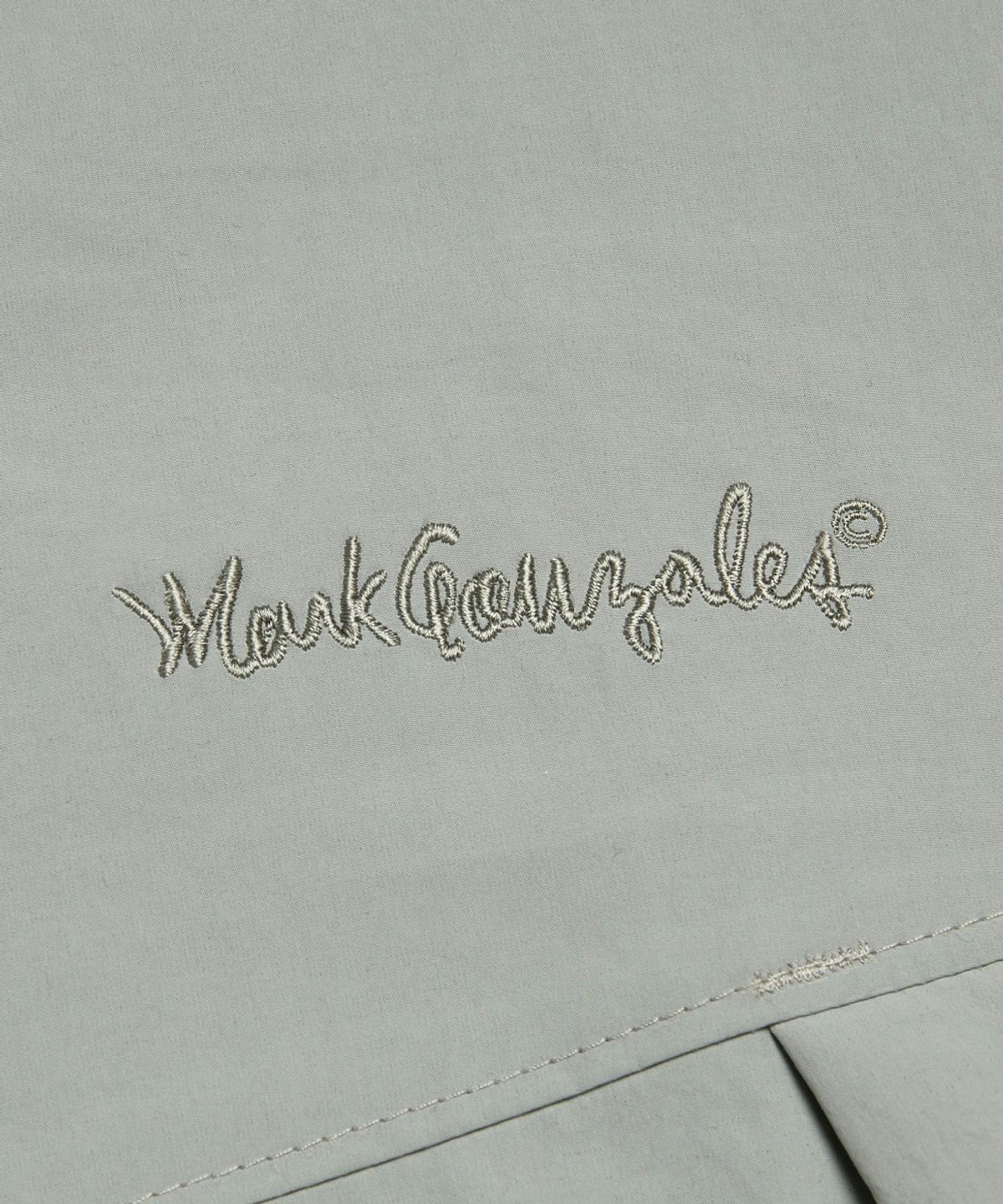 마크곤잘레스(MARK GONZALES) 사인로고 롱 패딩 자켓 - KHAKI