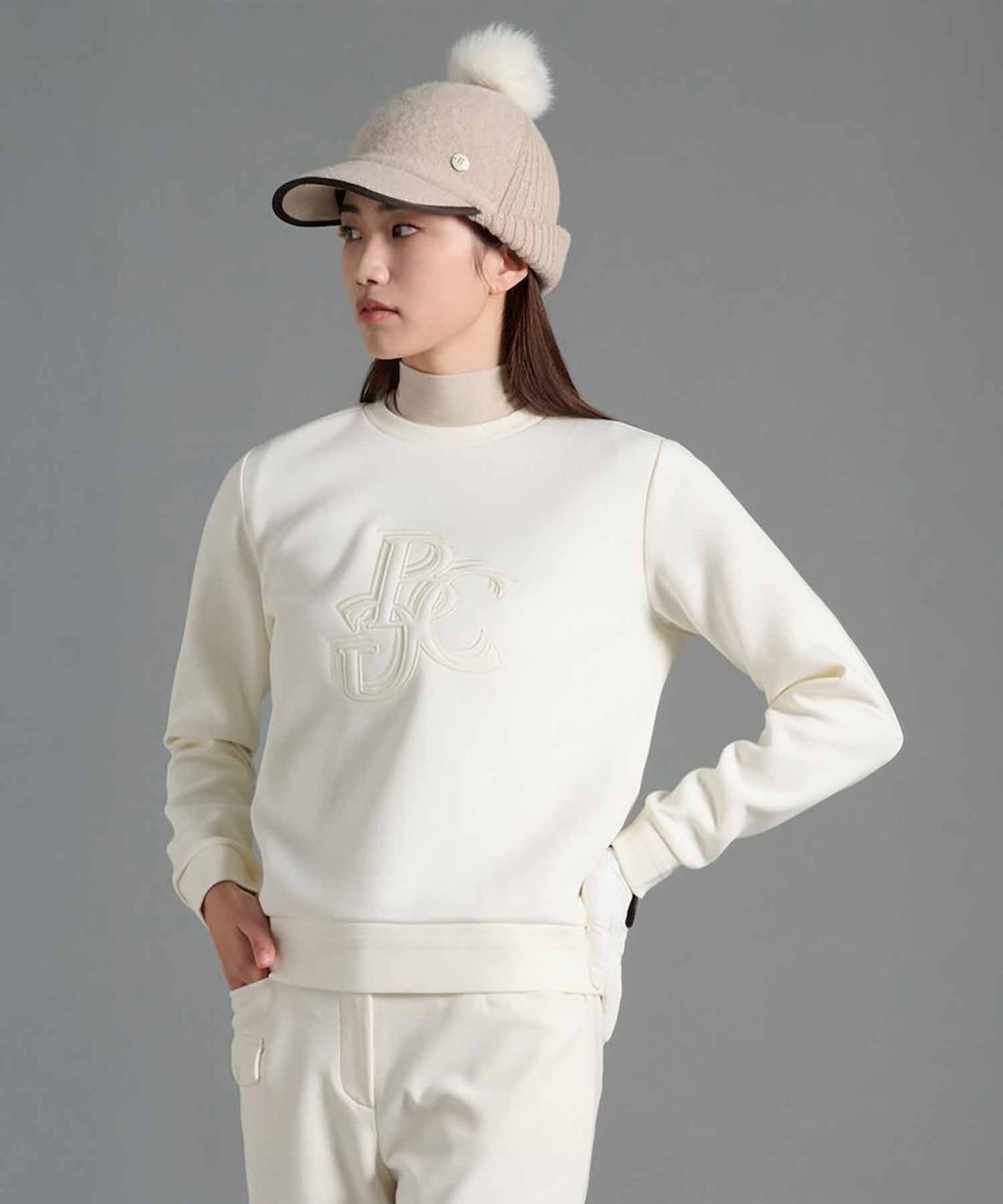 빈폴골프(BEANPOLE GOLF) 여성 라운드넥 블루종핏 긴소매 티셔츠 - 아이보리