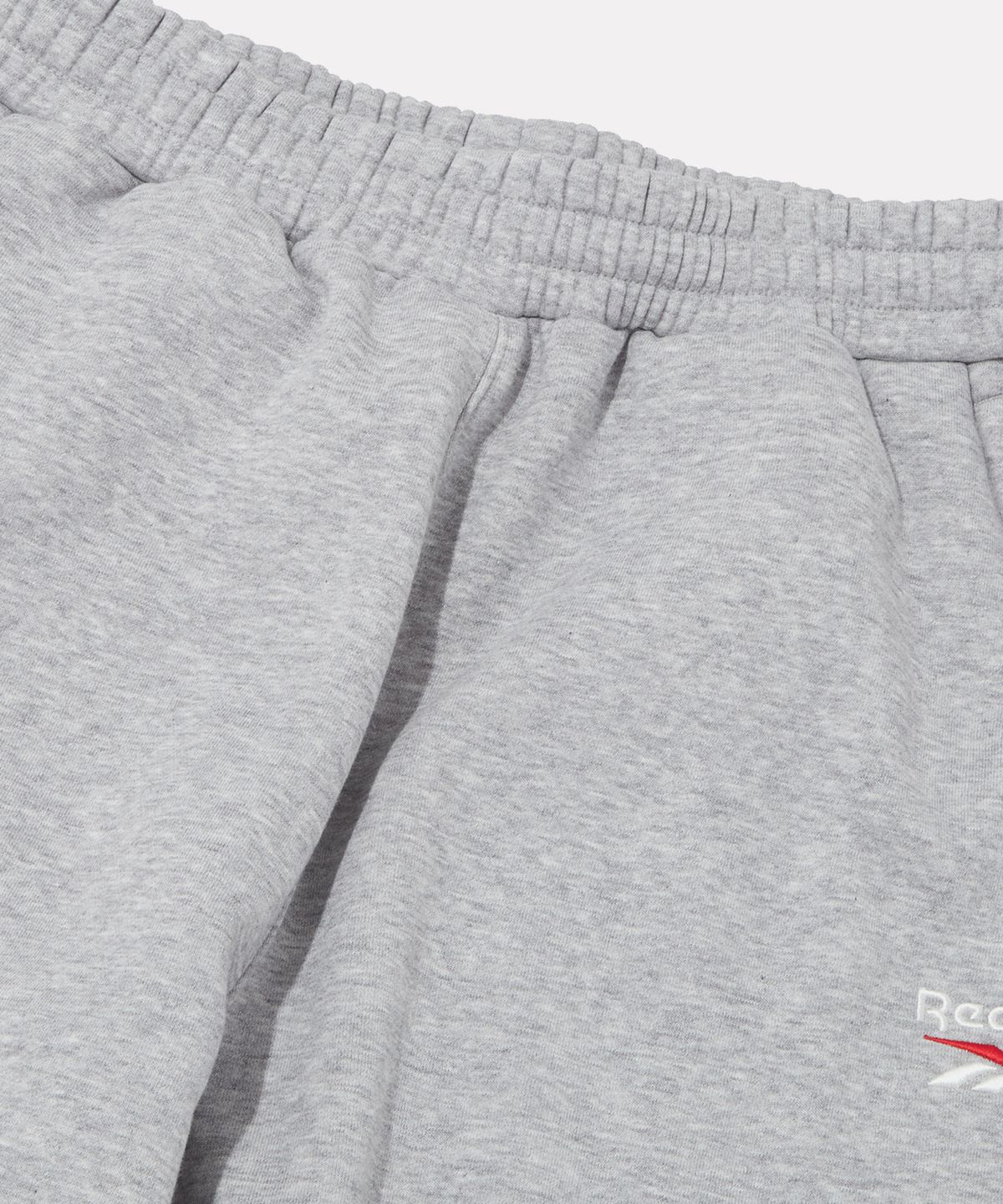 리복(REEBOK) 와이드핏 기모 스웻팬츠 - 멜란지 그레이