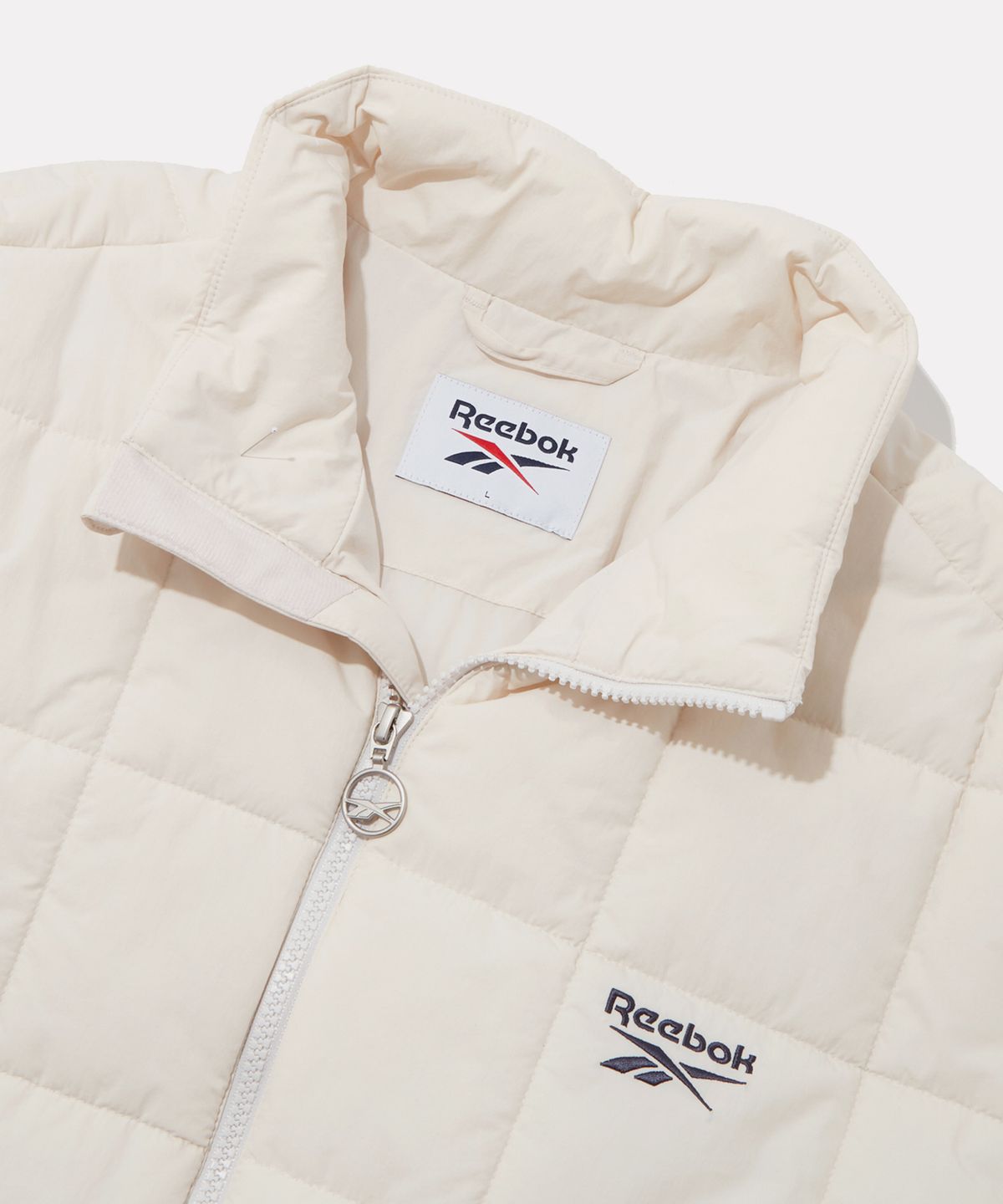 리복(REEBOK) 스퀘어 퀼팅 패딩 자켓 - 아이보리