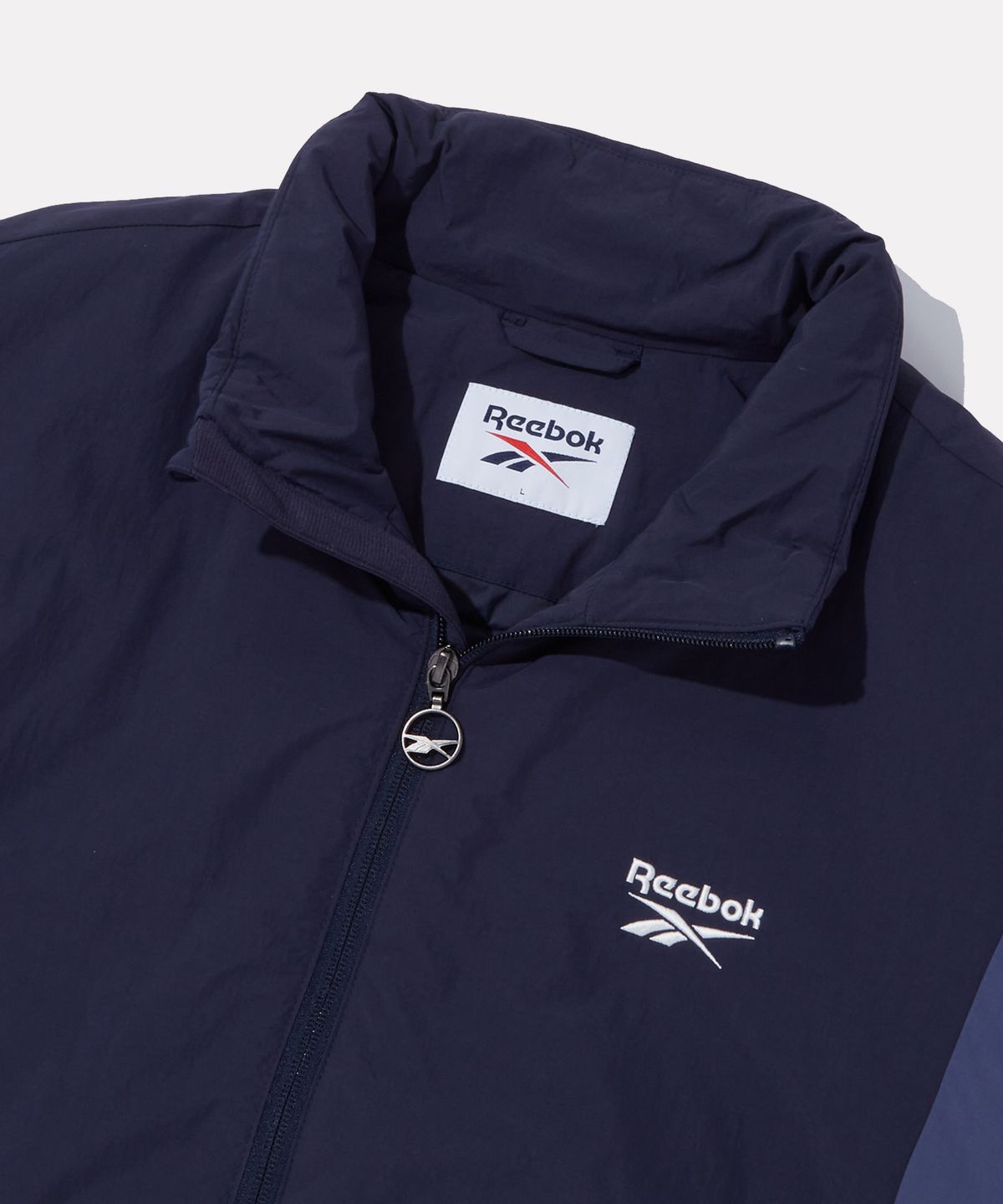리복(REEBOK) 헤리티지 경량패딩 - 네이비