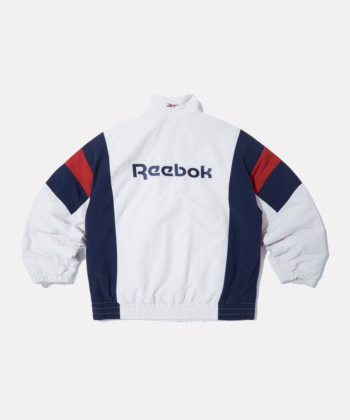 리복(REEBOK) 헤리티지 경량패딩 - 크림