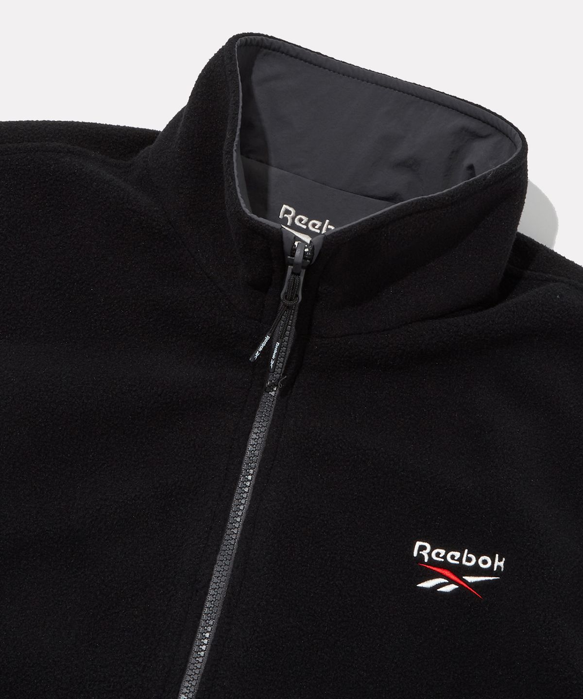 리복(REEBOK) 플리스 리버서블 자켓 - 블랙:차콜