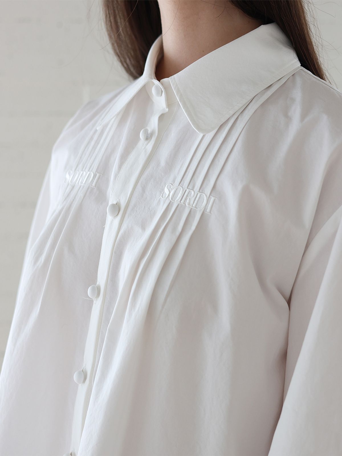 소르디(SORDI) Posy Pintuck Blouse_white