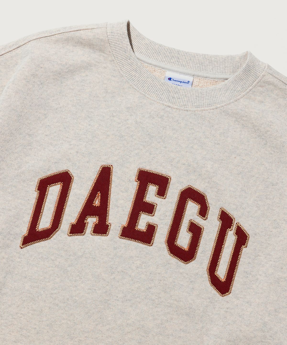 챔피온(CHAMPION) C로고 루즈핏 시티 스웨트셔츠 DAEGU