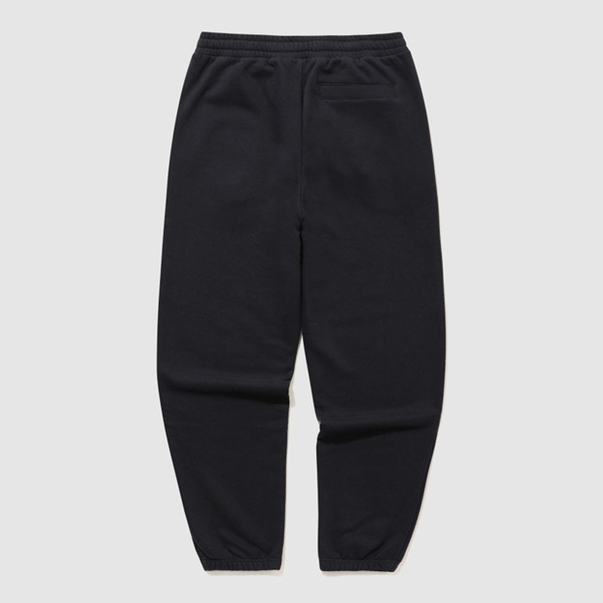 엄브로(UMBRO) 에센셜 기모 루즈 조거 팬츠 블랙 UQ423CFPO1