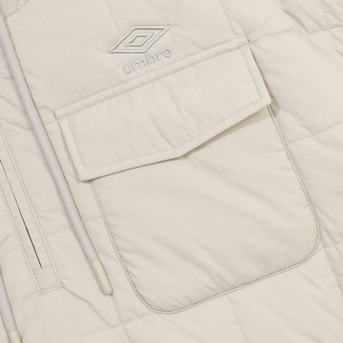 엄브로(UMBRO) 멜로우 퀼티드 패딩 후드아노락 베이지 UQ423CWTO1