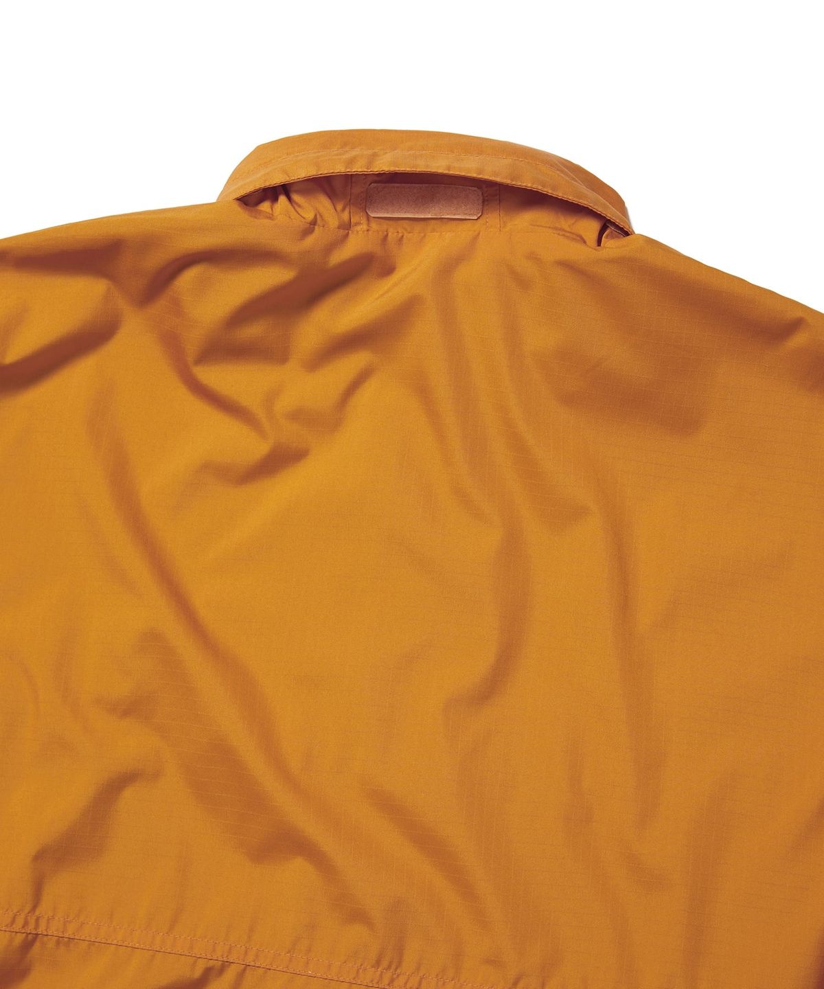 디스이즈네버댓(THISISNEVERTHAT) Reversible Air Pullover Orange