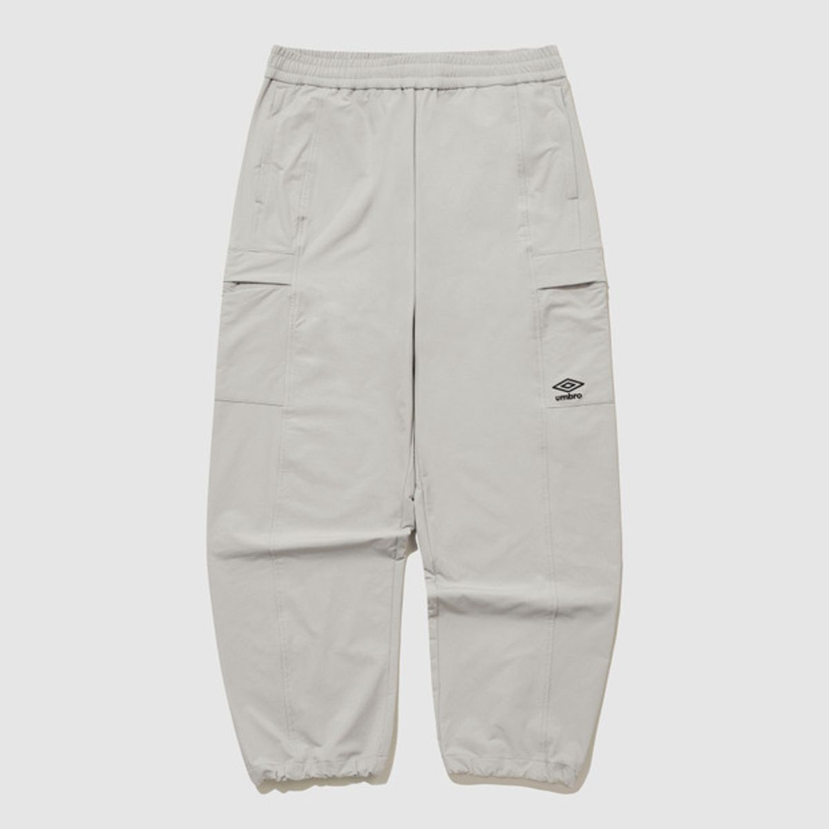 엄브로(UMBRO) 폴라 스트레치 기모 카고 스트레이트 & 조거 2WAY 팬츠 베이지 UQ421SPTO2