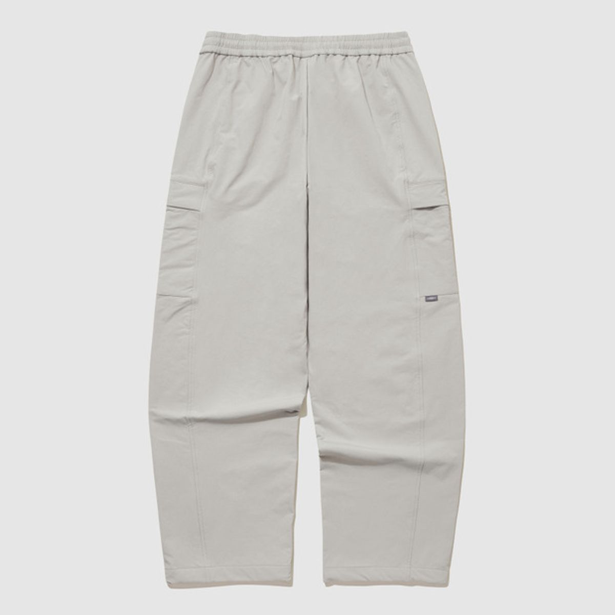 엄브로(UMBRO) 폴라 스트레치 기모 카고 스트레이트 & 조거 2WAY 팬츠 베이지 UQ421SPTO2