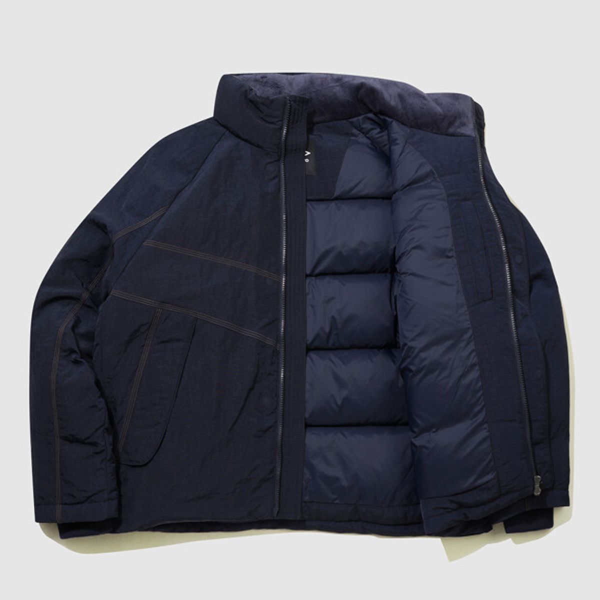 엄브로(UMBRO) 크리스피 타슬란 머스코비 덕 다운 자켓 네이비 UQ321CDJ92